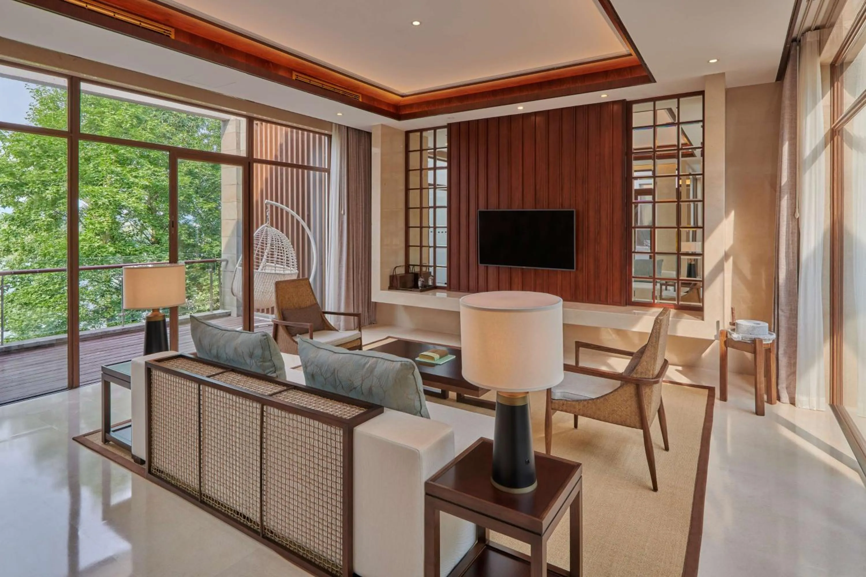 Living room in Lushan West Sea Resort, Curio Collection by Hilton