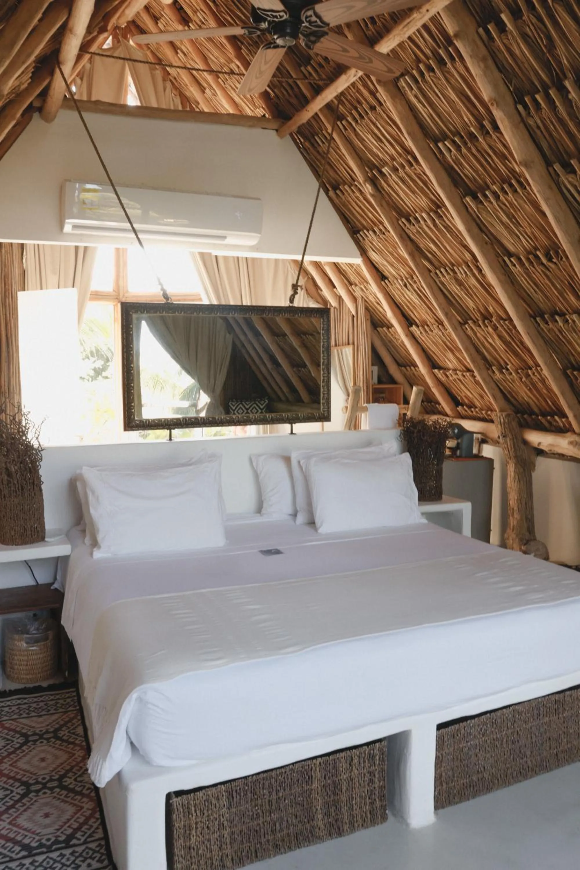 Bed in Éteka Slow Beach Hotel Adults Only