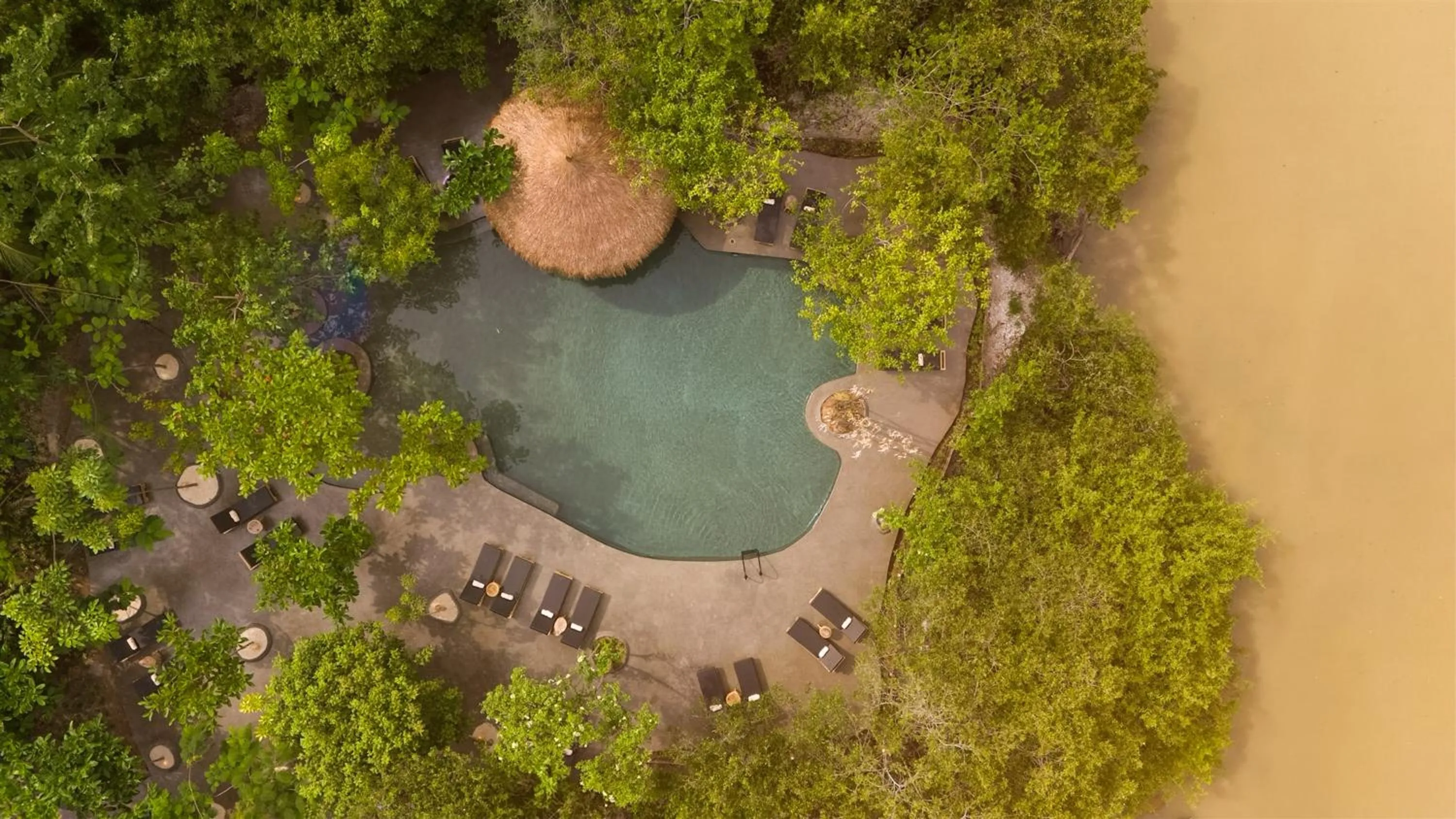 Swimming pool in Éteka Slow Beach Hotel Adults Only