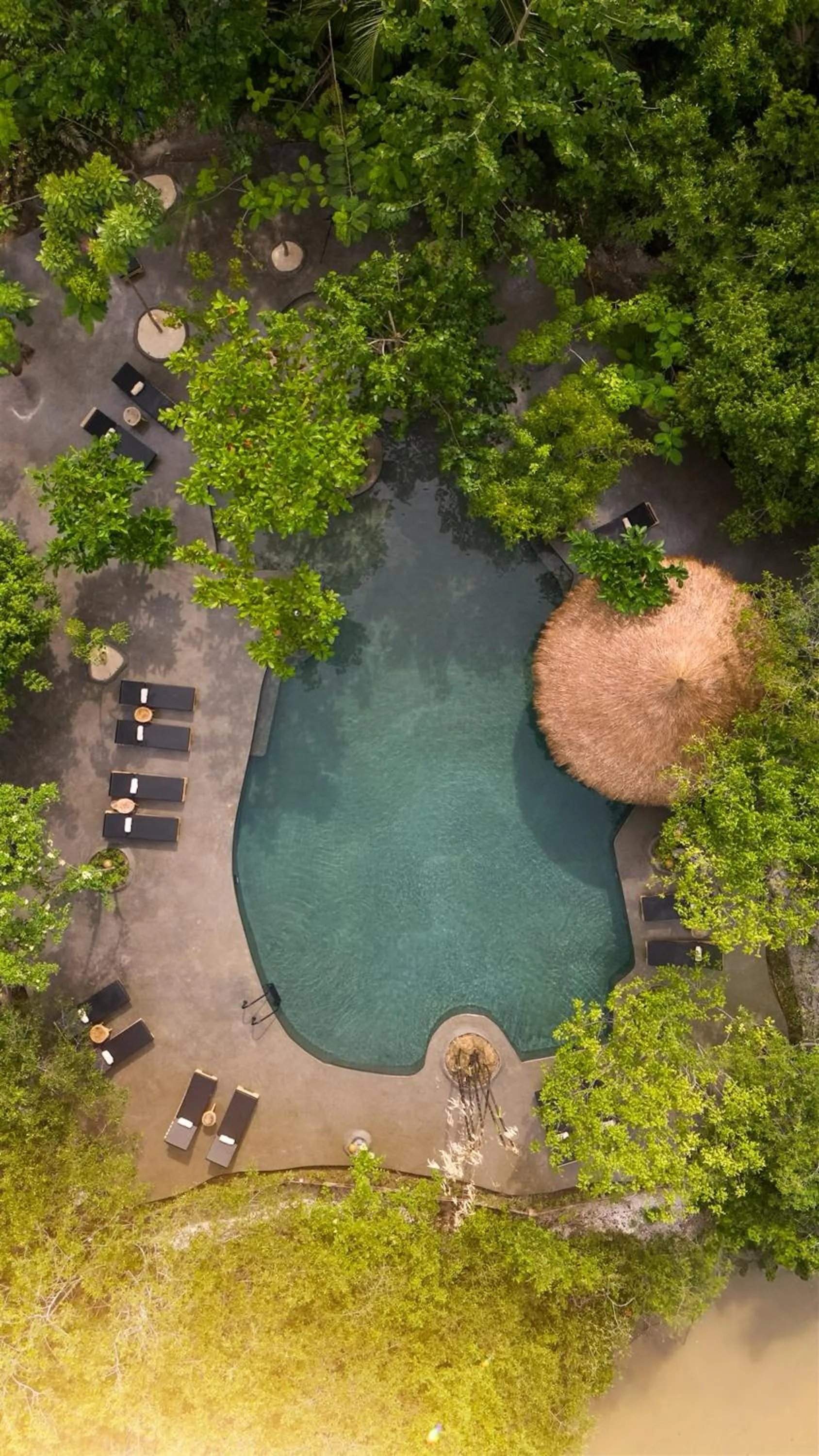 Swimming pool in Éteka Slow Beach Hotel Adults Only