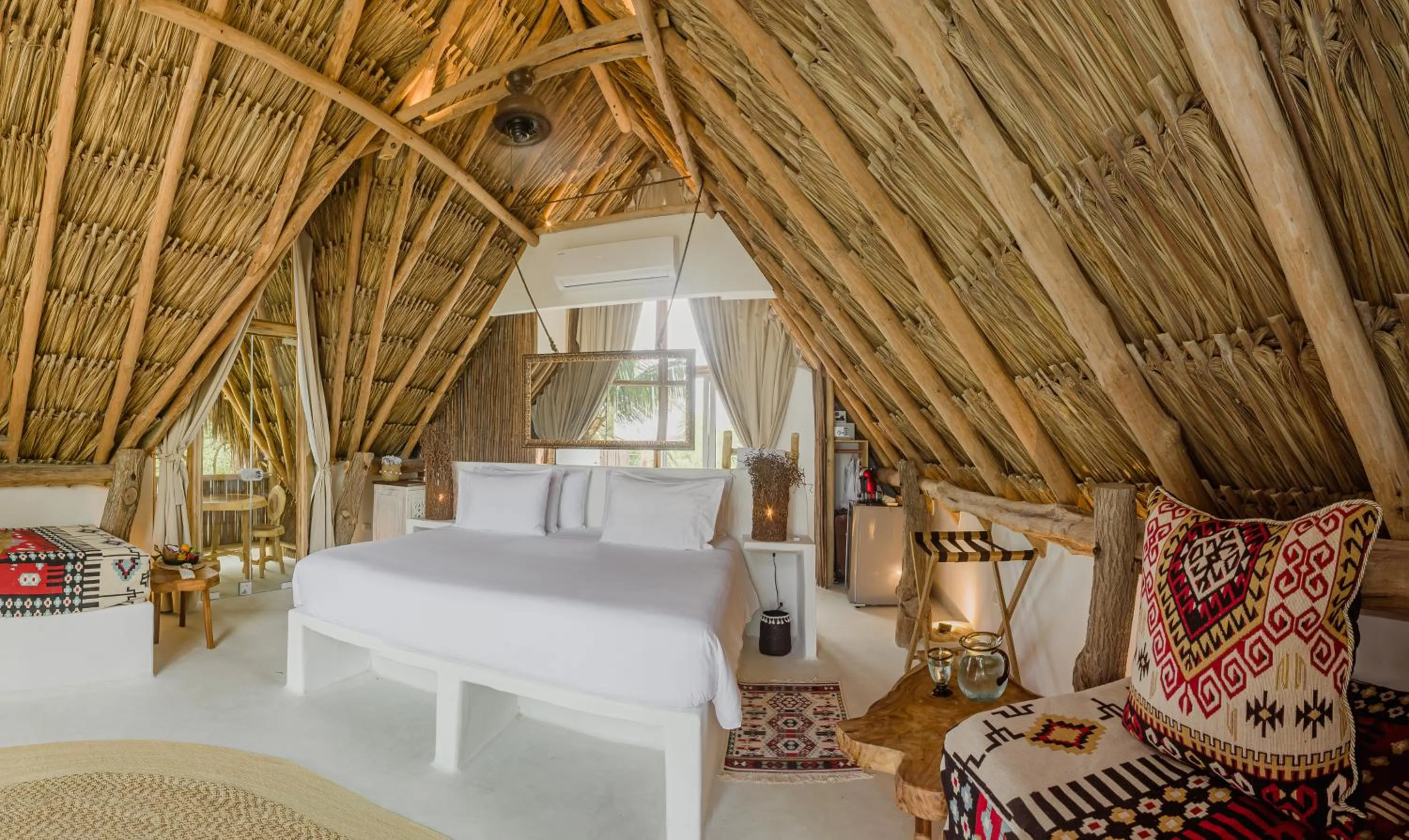 Bed in Éteka Slow Beach Hotel Adults Only