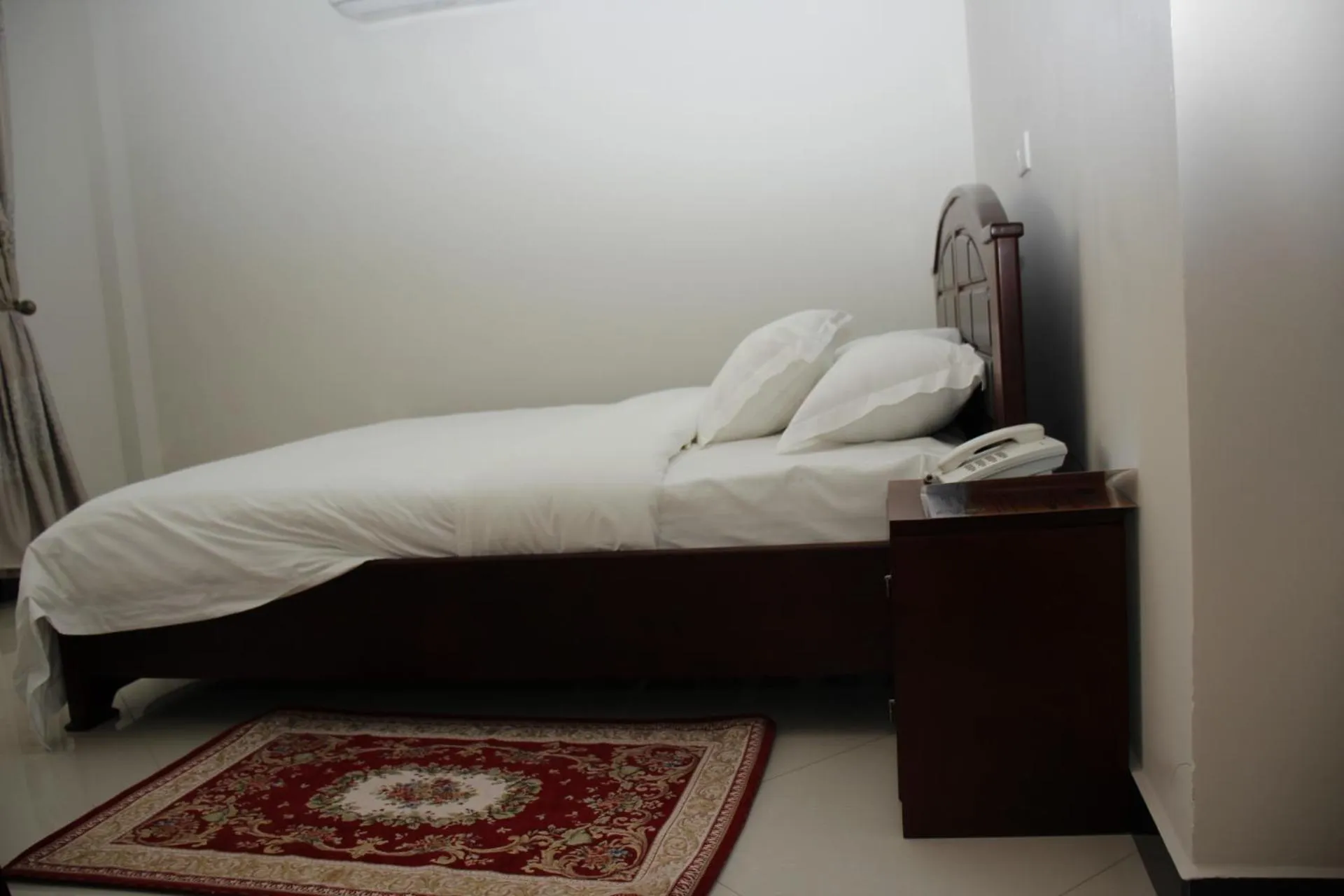 Bed in Kenlon Hotel Kampala