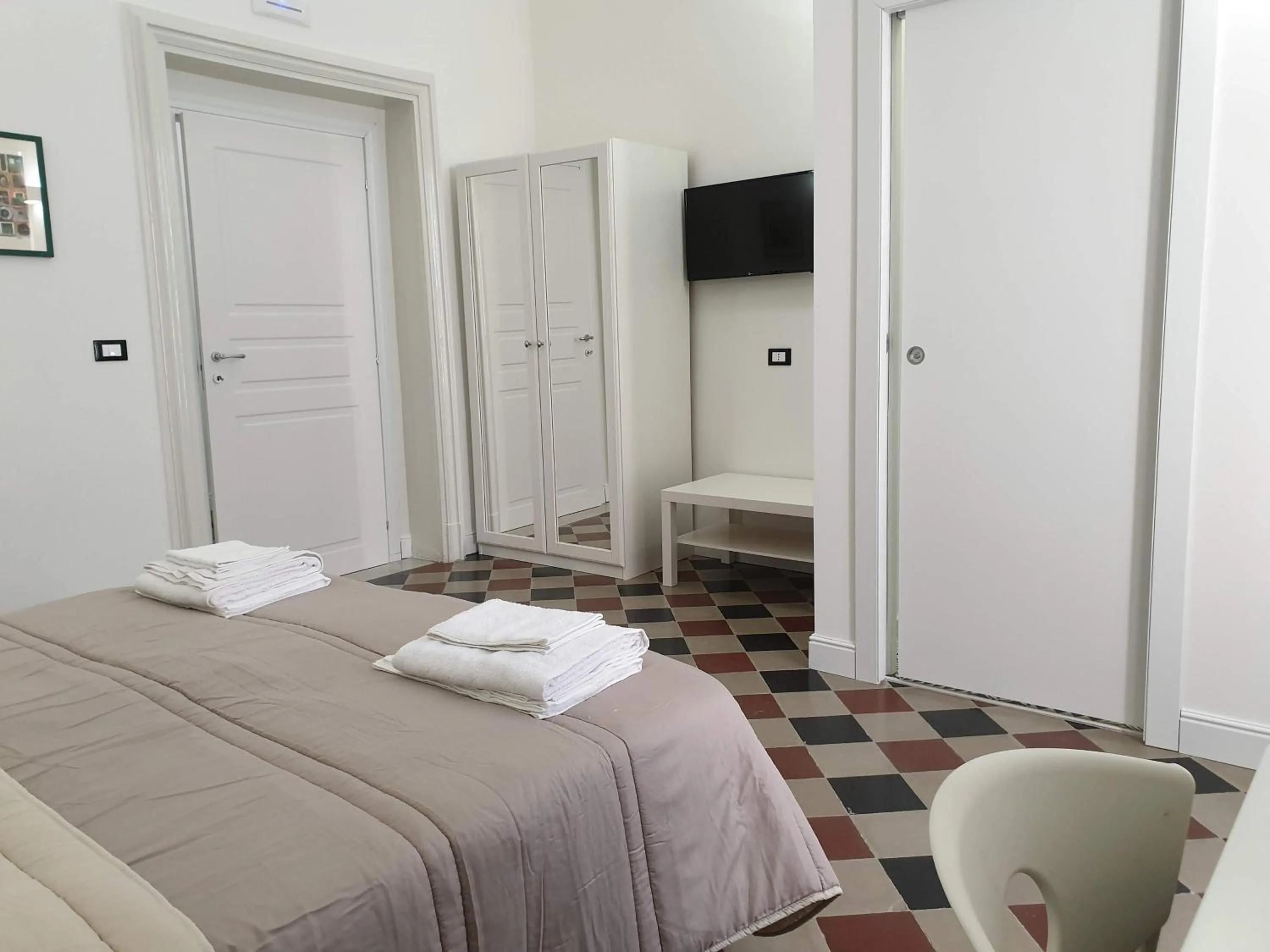 Bed in Duomo Rooms b&b