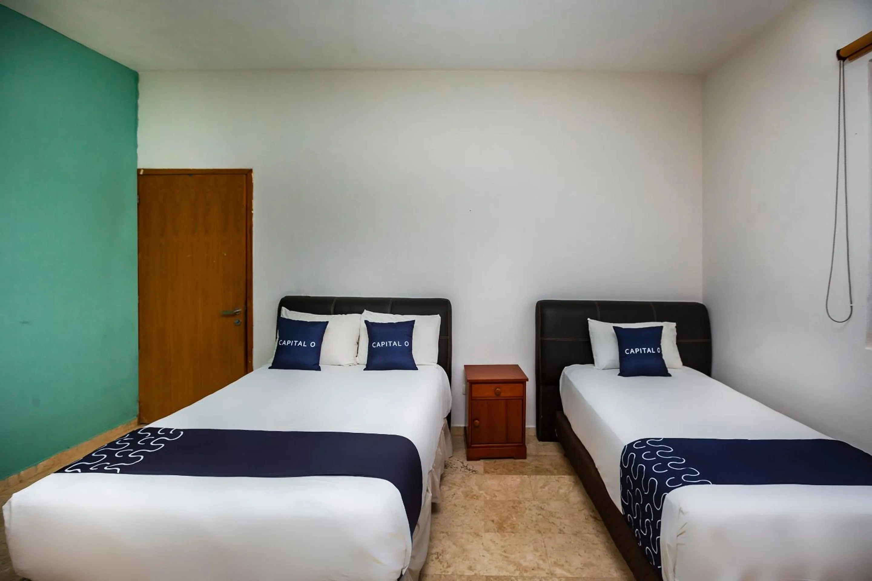 Bedroom, Bed in Capital O Cancun International Airport 24 7