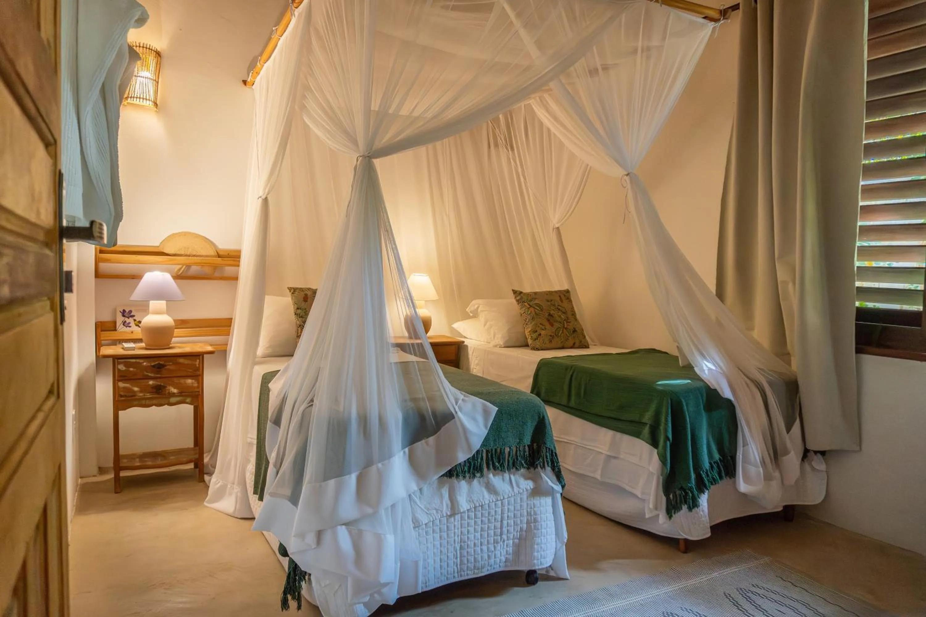 Bed in POUSADA CARMELITHA