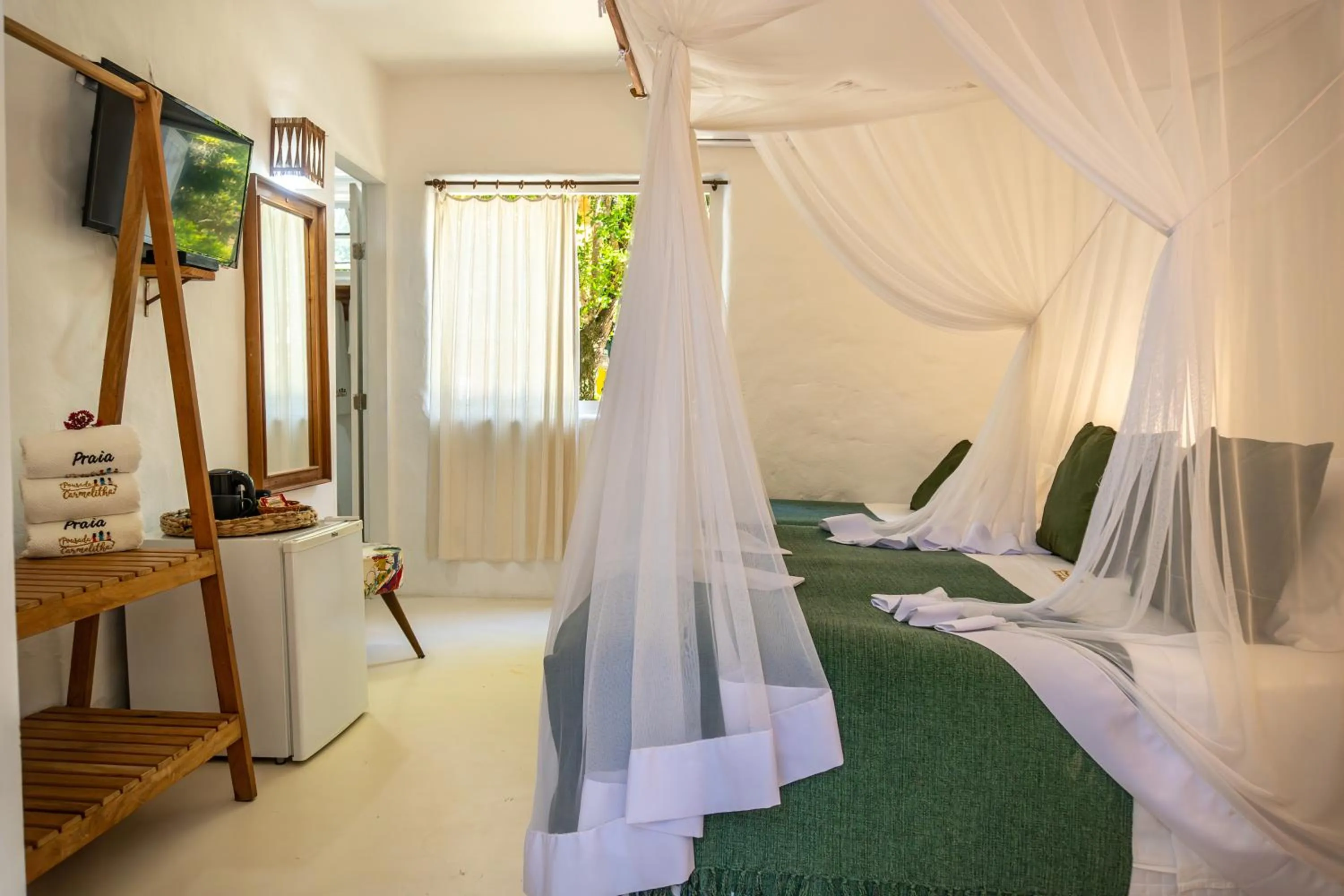 View (from property/room), Bed in POUSADA CARMELITHA