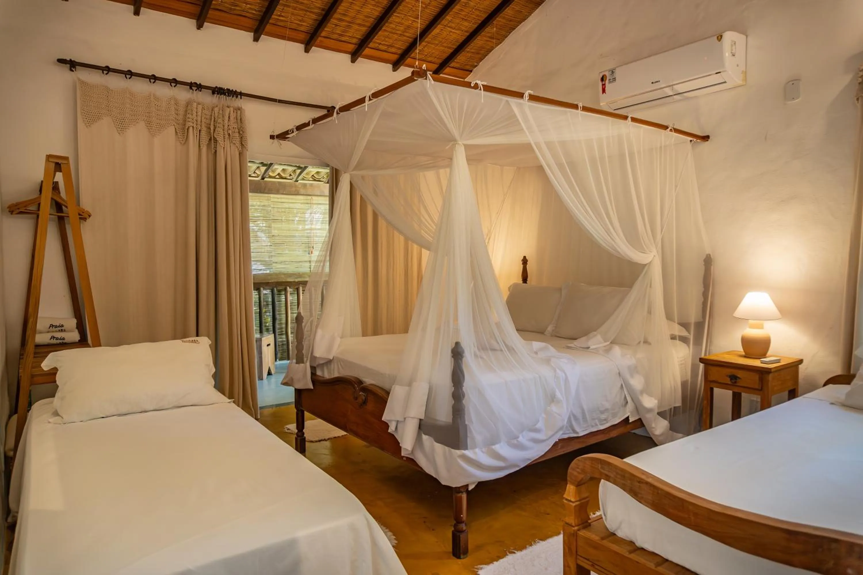 Bed in POUSADA CARMELITHA