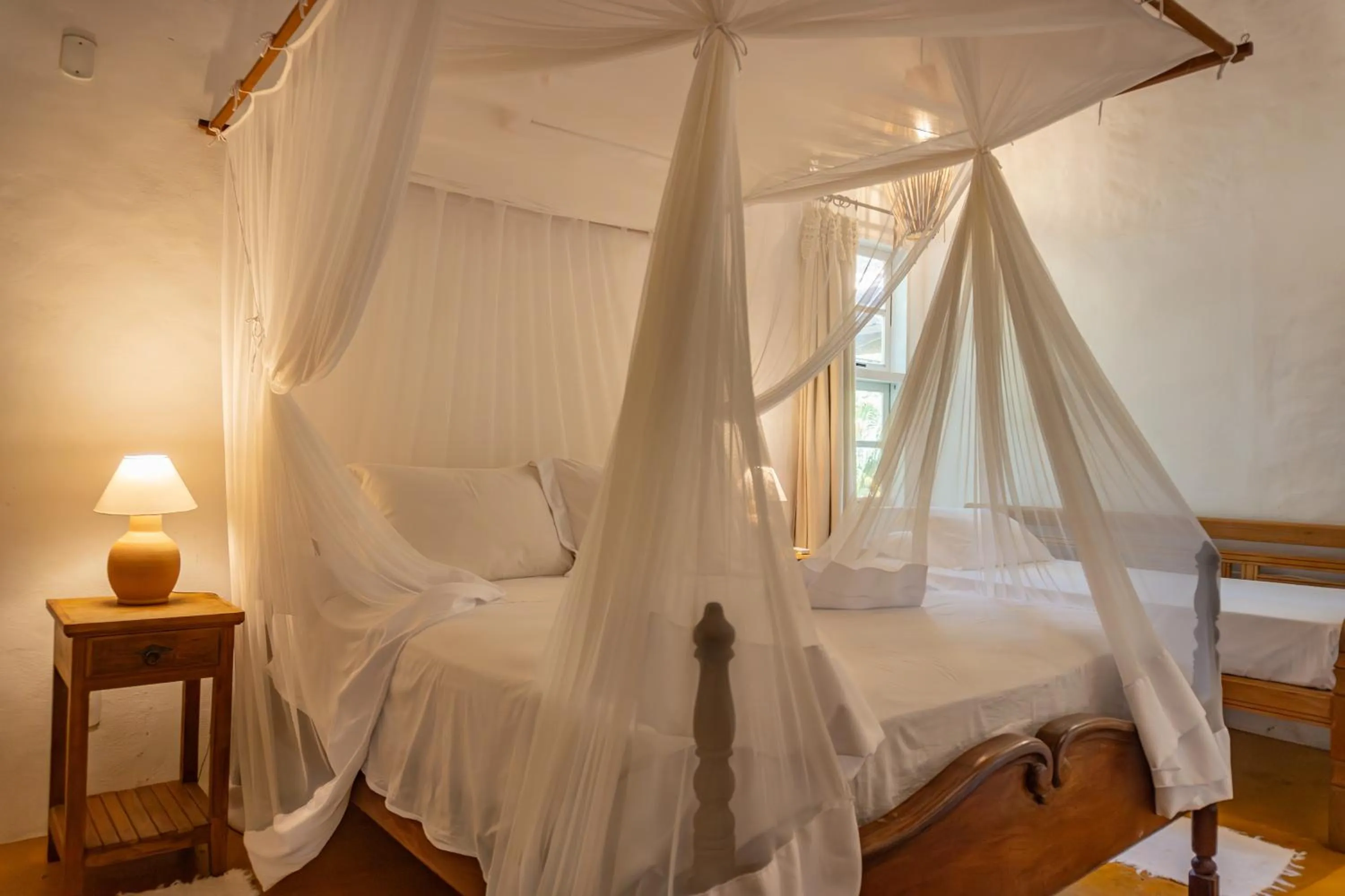 Property building, Bed in POUSADA CARMELITHA