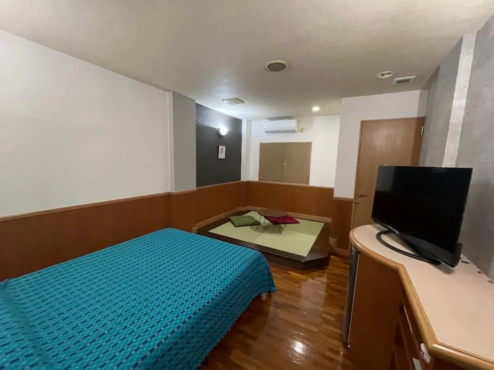 Photo of the whole room, Bed in Hotel bin