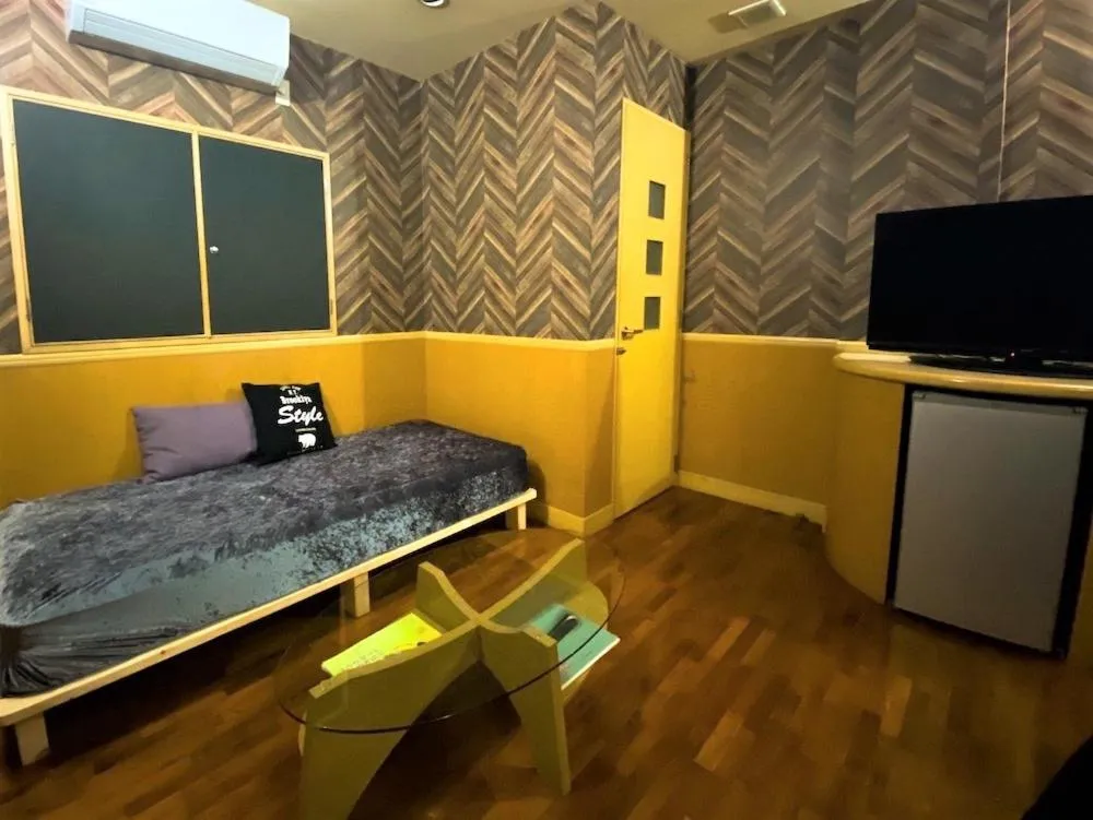 Photo of the whole room, Bed in Hotel bin