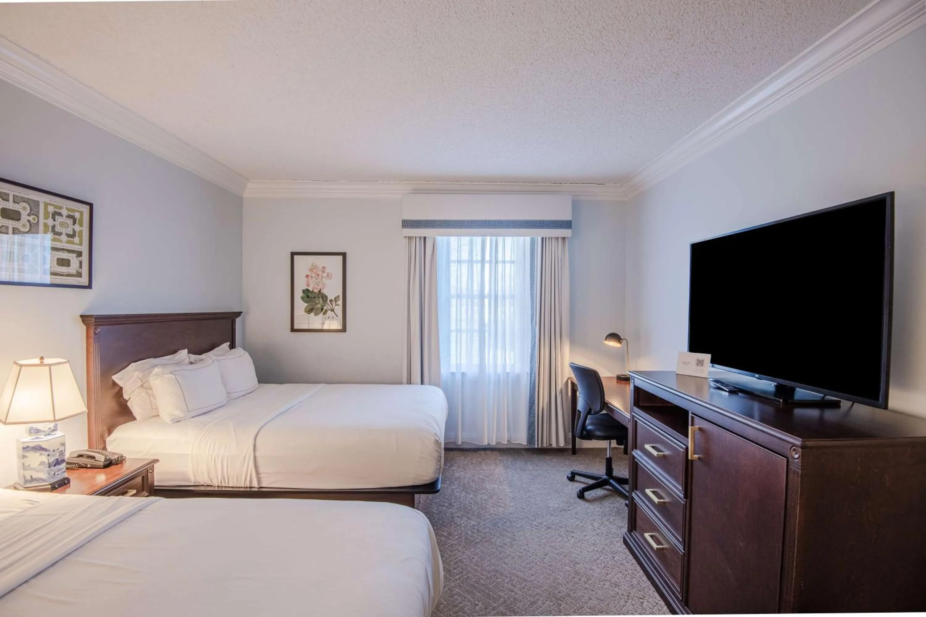 Bed in The Founders Inn & Spa Tapestry Collection By Hilton