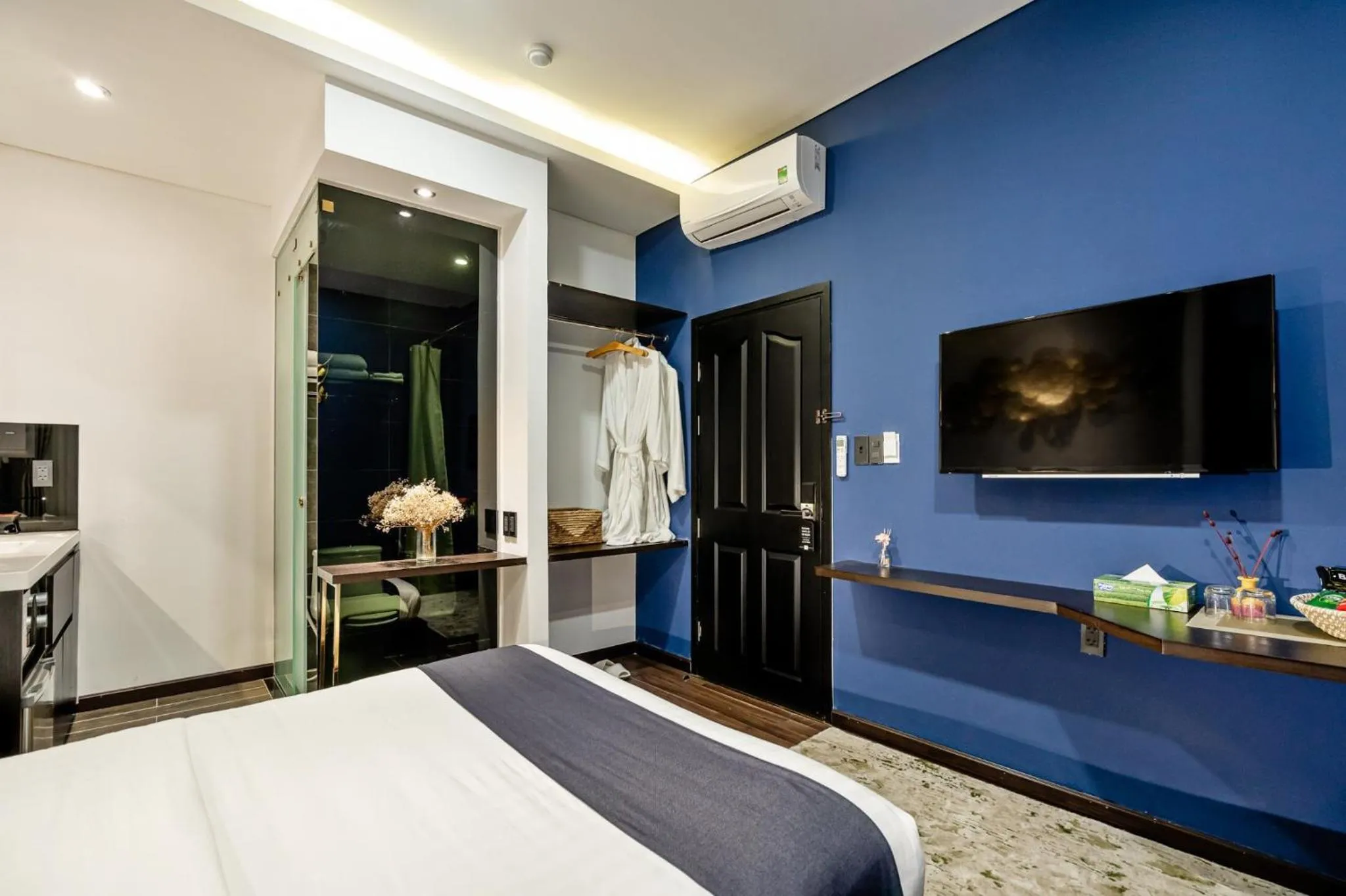 Bed in KunKin Luxury Hotel & Apartment