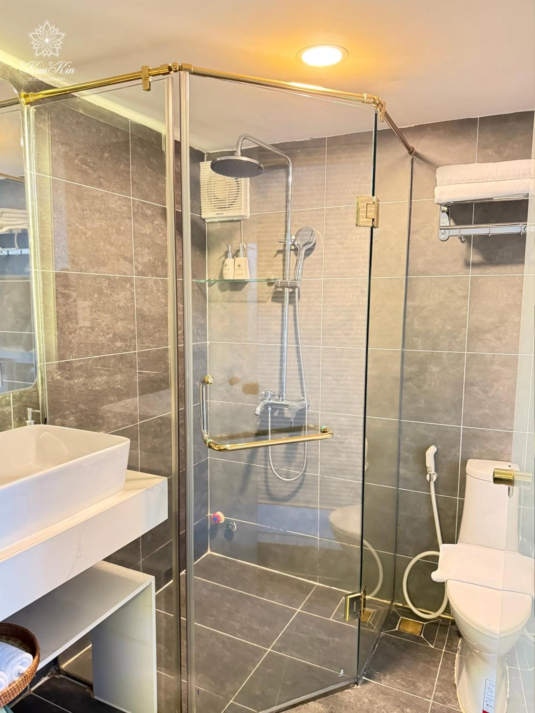 Bathroom in KunKin Luxury Hotel & Apartment