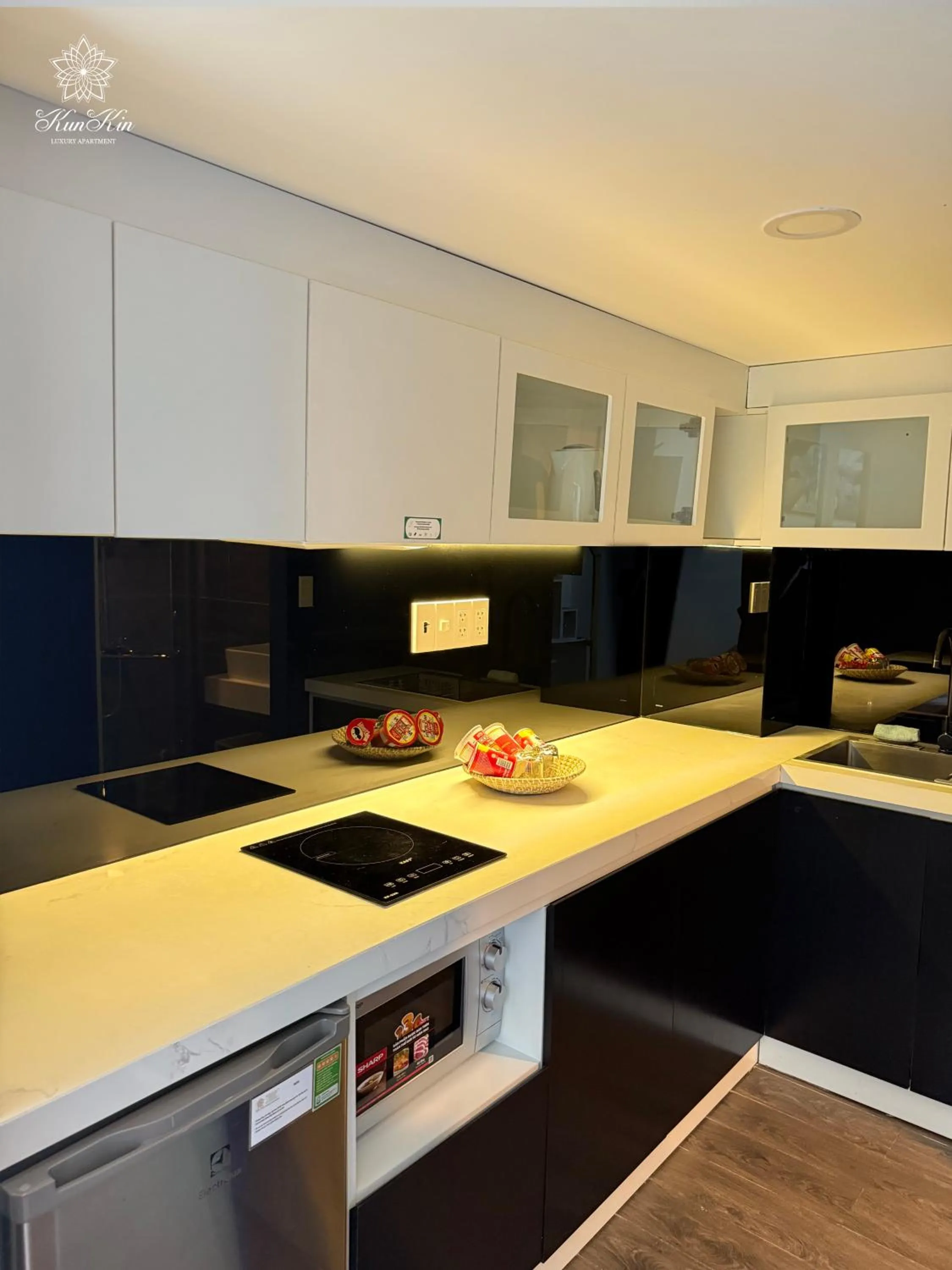 Kitchen or kitchenette in KunKin Luxury Hotel & Apartment