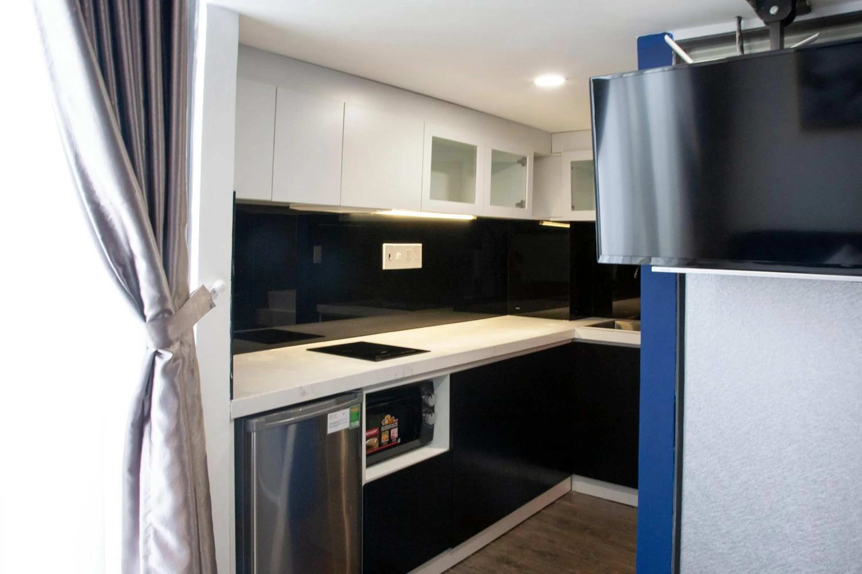Kitchen or kitchenette in KunKin Luxury Hotel & Apartment