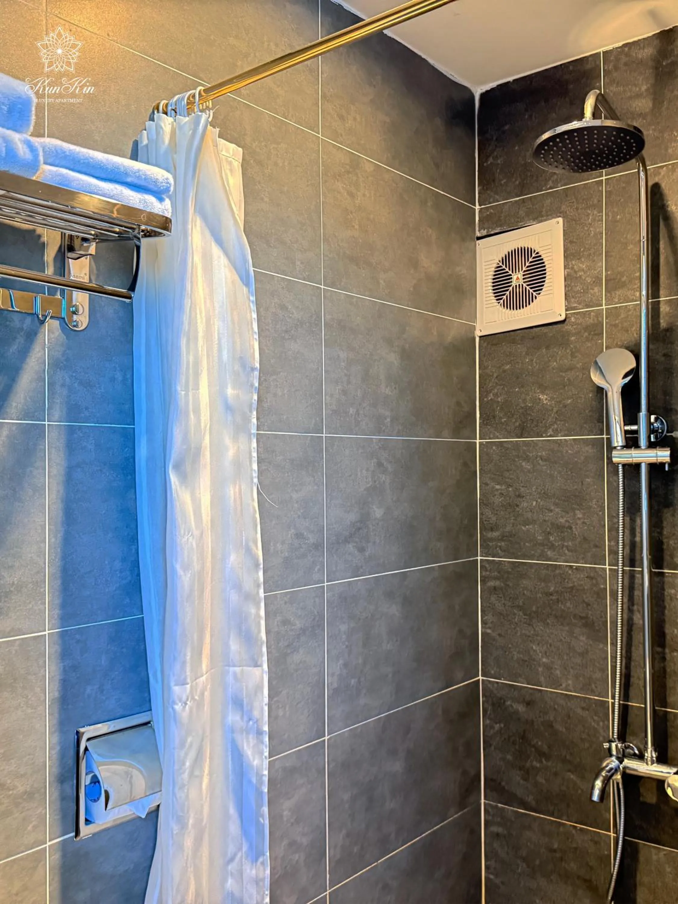 Bathroom in KunKin Luxury Hotel & Apartment