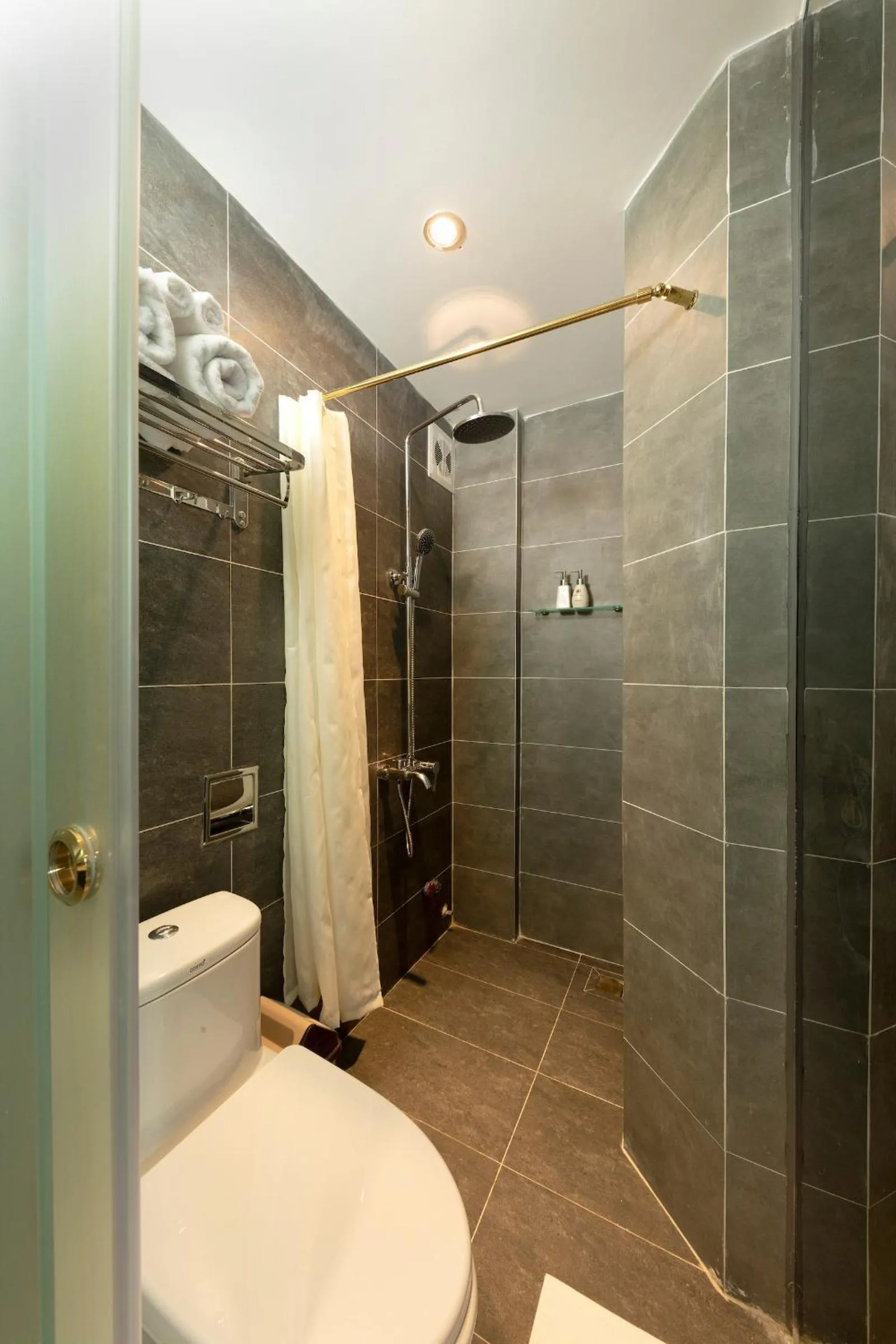 Bathroom in KunKin Luxury Hotel & Apartment