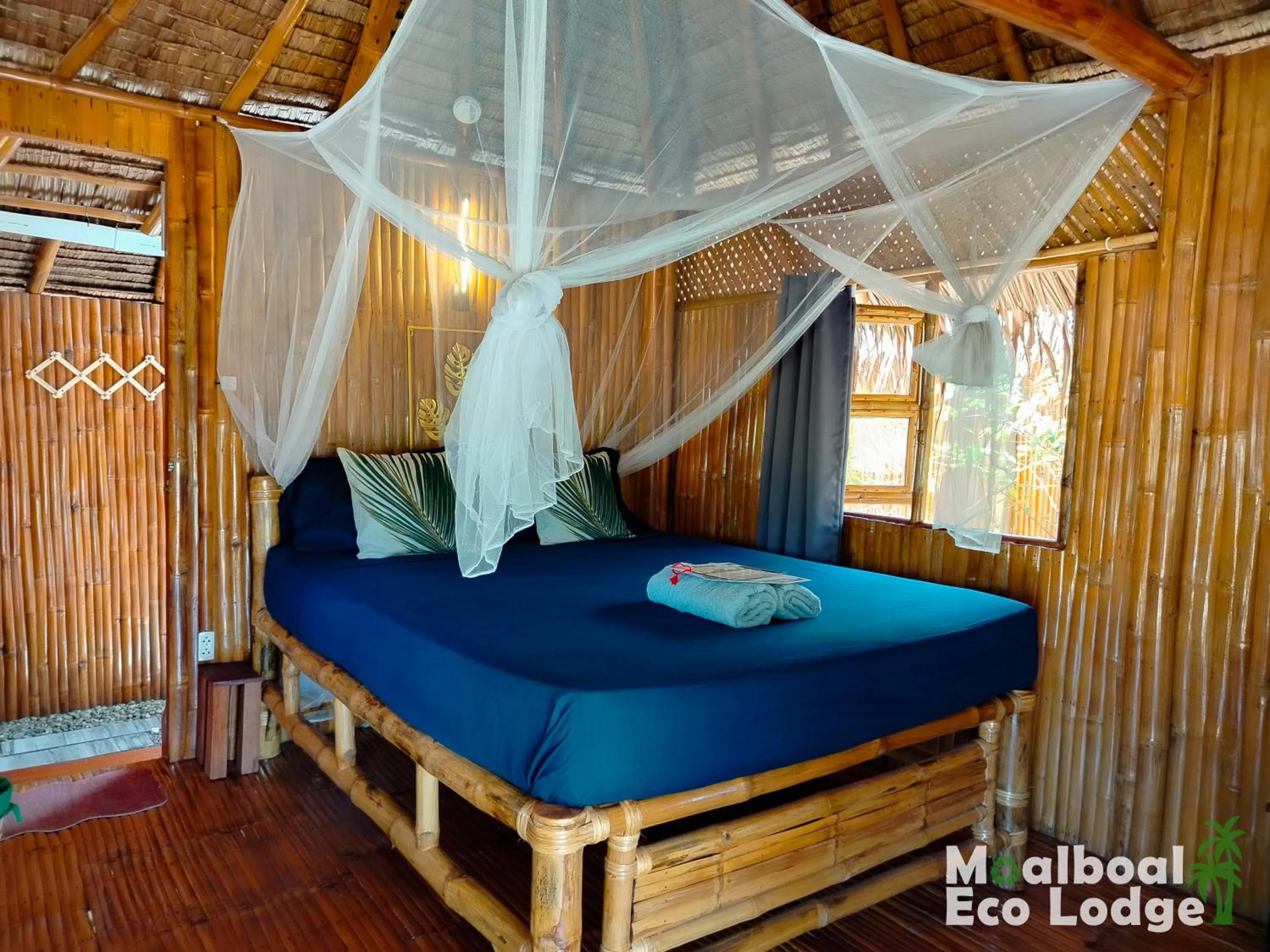 Bed in Moalboal Eco Lodge