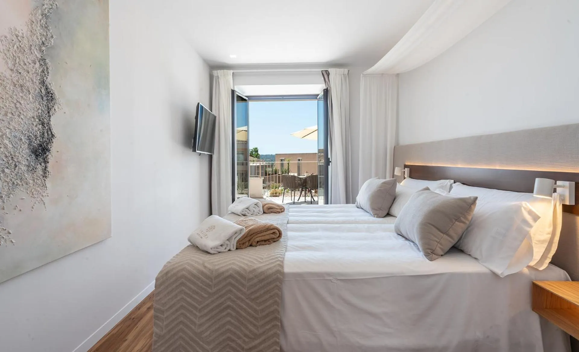 Bed in Ynaira hotel & Spa