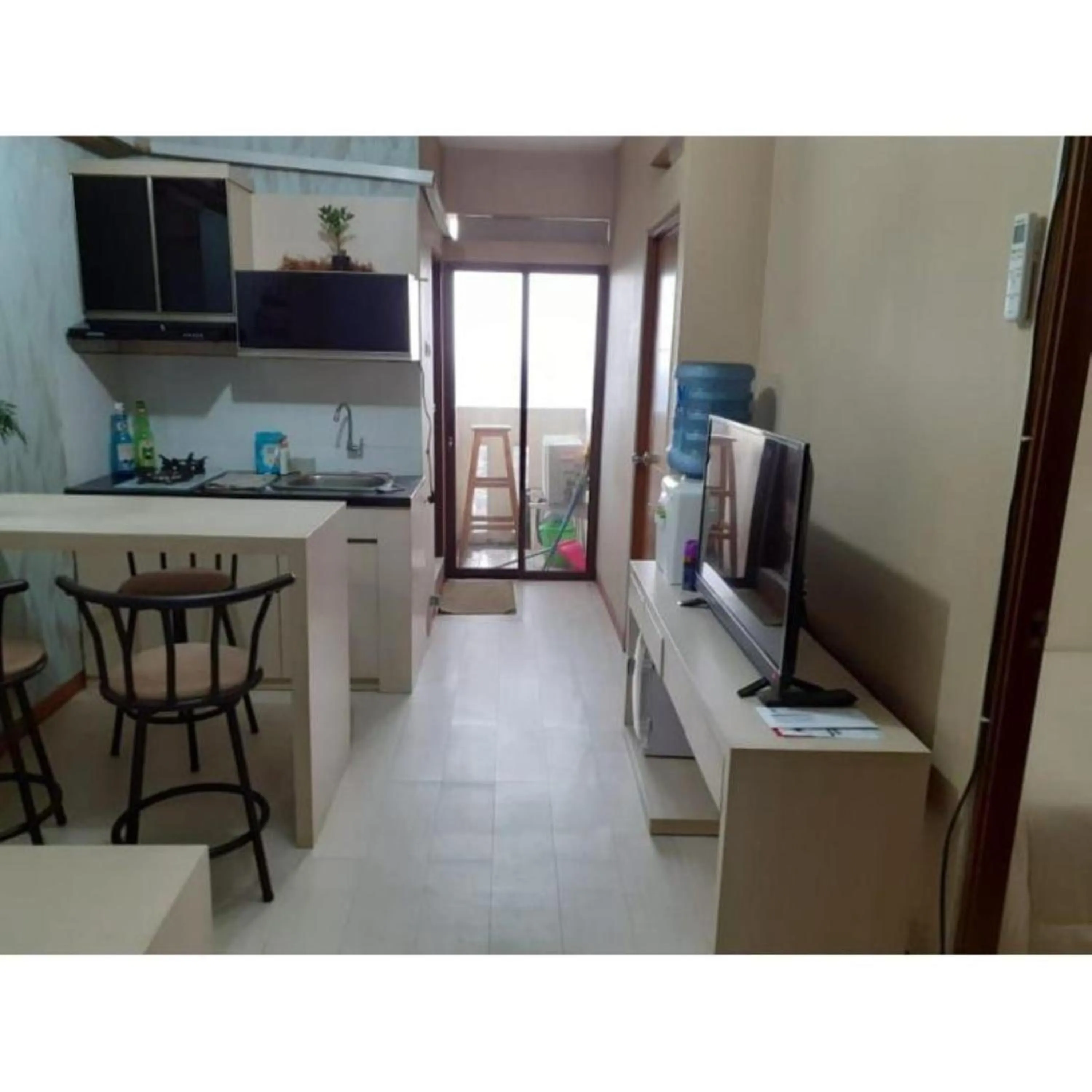 TV and multimedia in Gateway Apartment Cicadas by DB Property