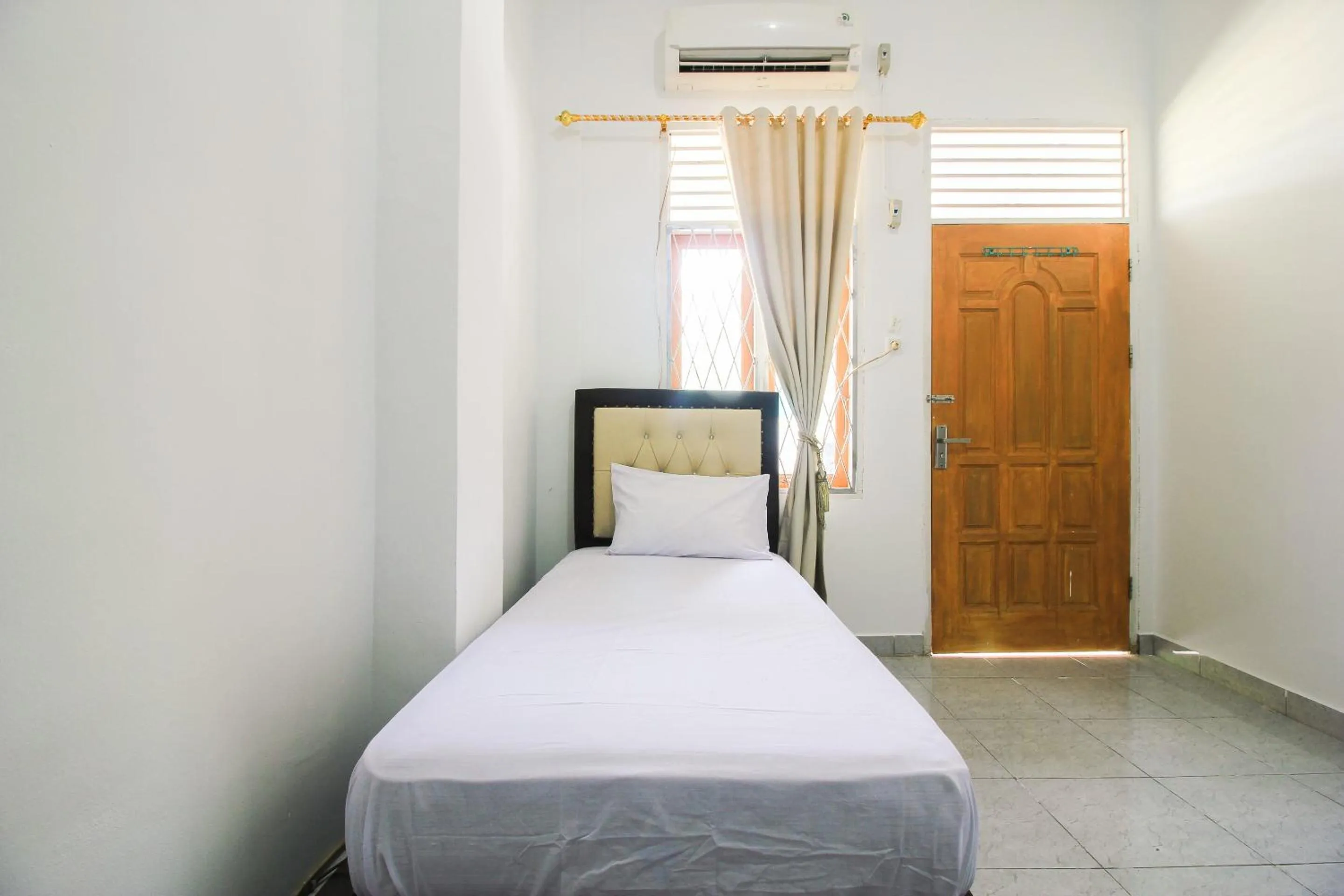 Bedroom in OYO Life 2553 Kost Daya