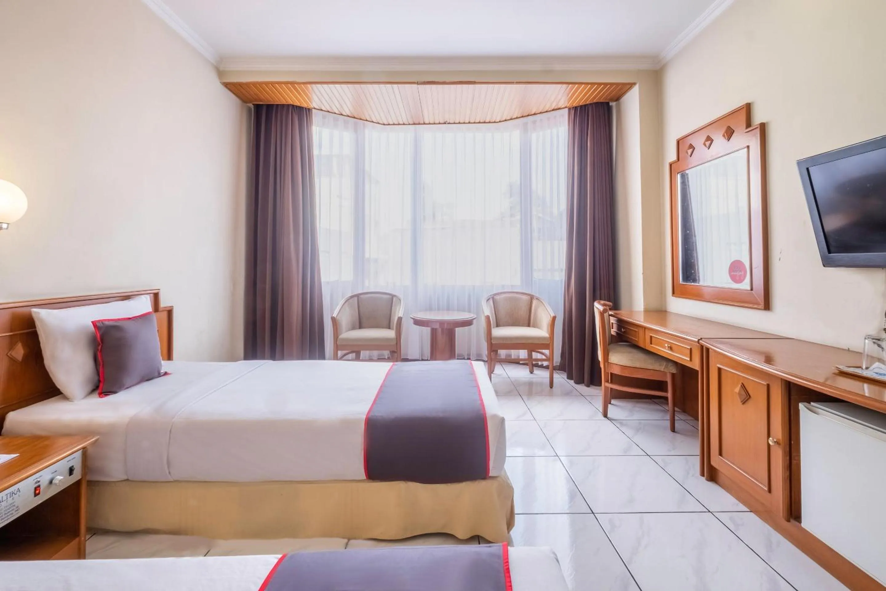 Bedroom in Collection O 25 Hotel Baltika