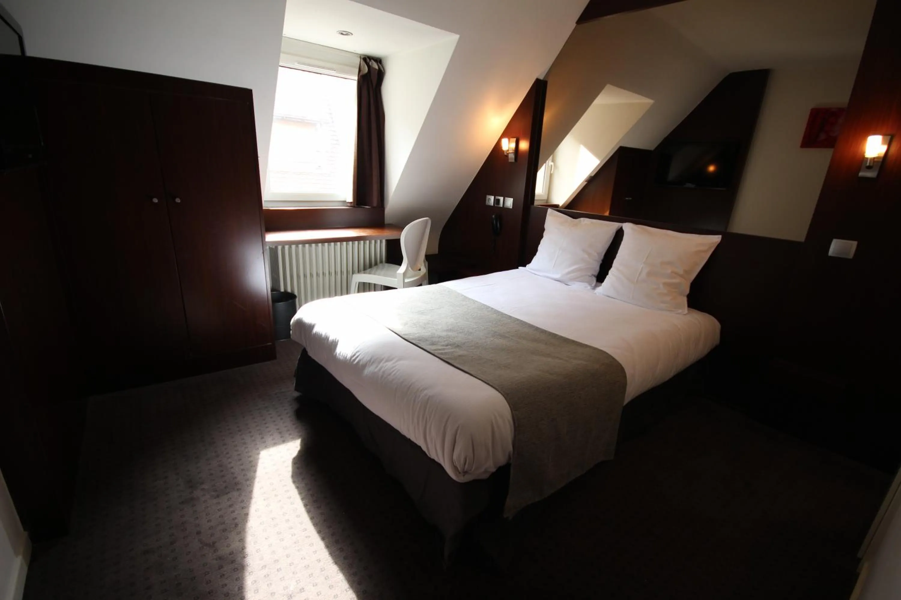 Bed in Hotel des Tonneliers