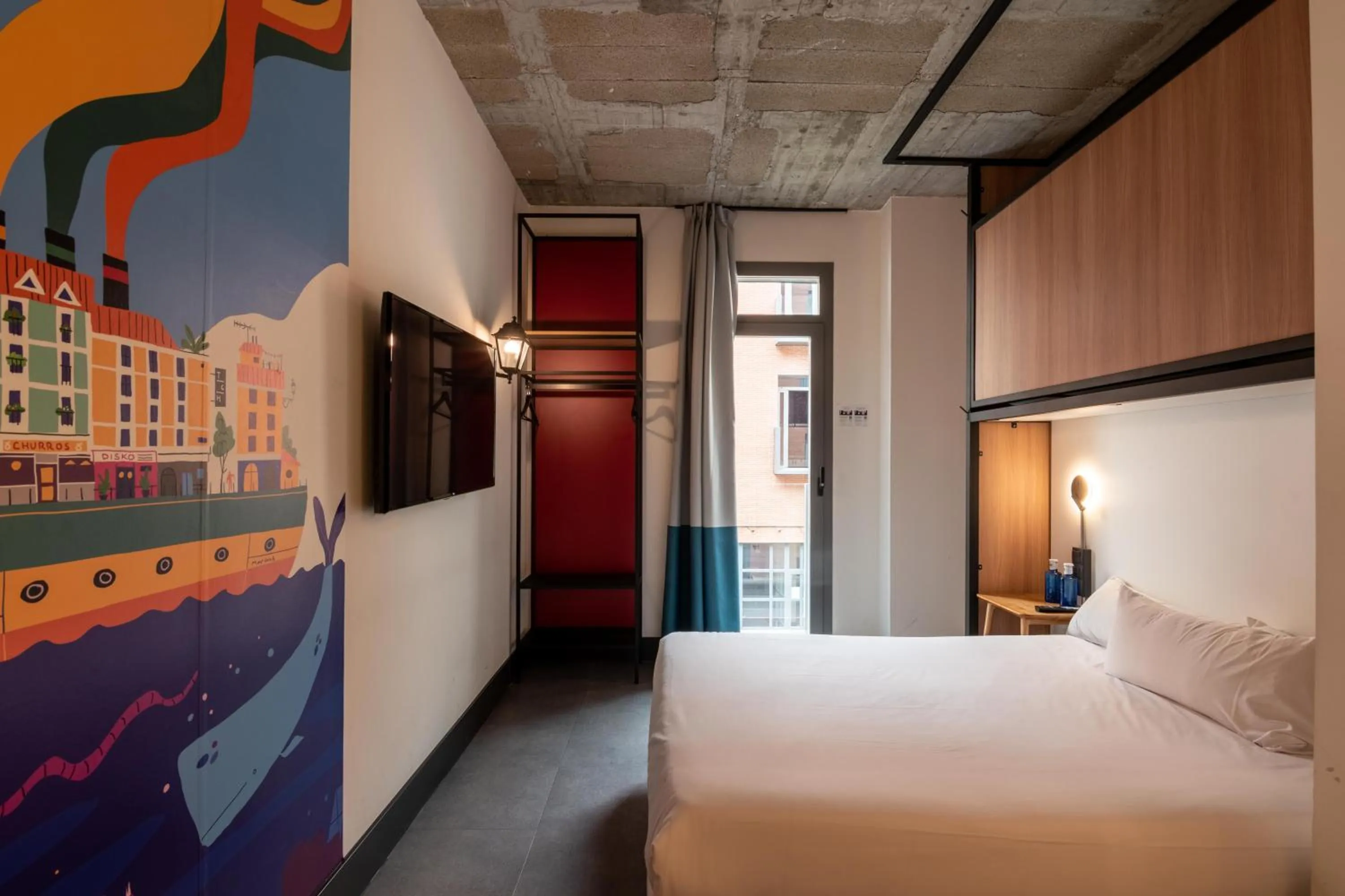 Bed in The Central House Madrid Lavapiés