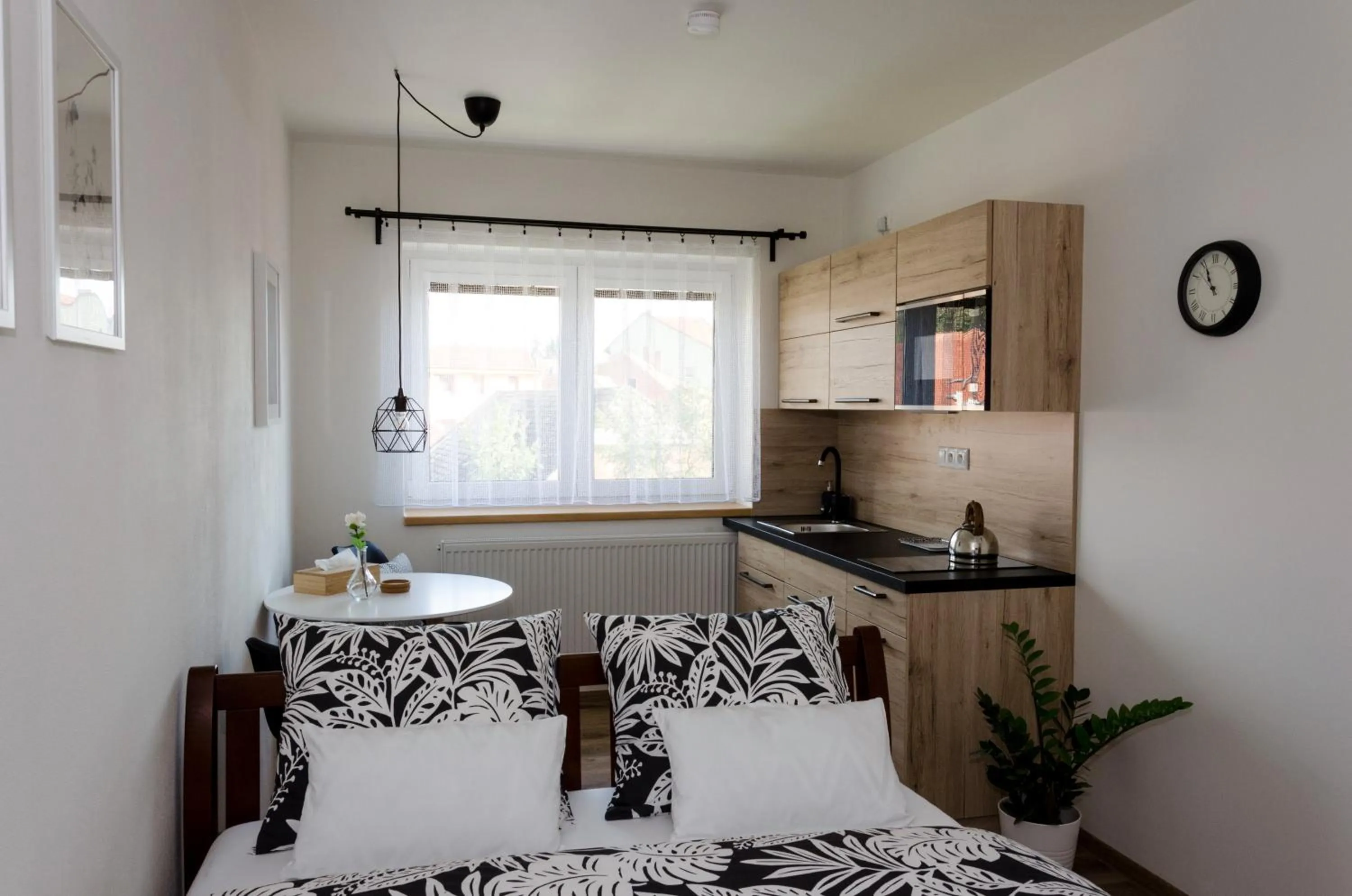 Kitchen or kitchenette in Apartmány u Kotačků