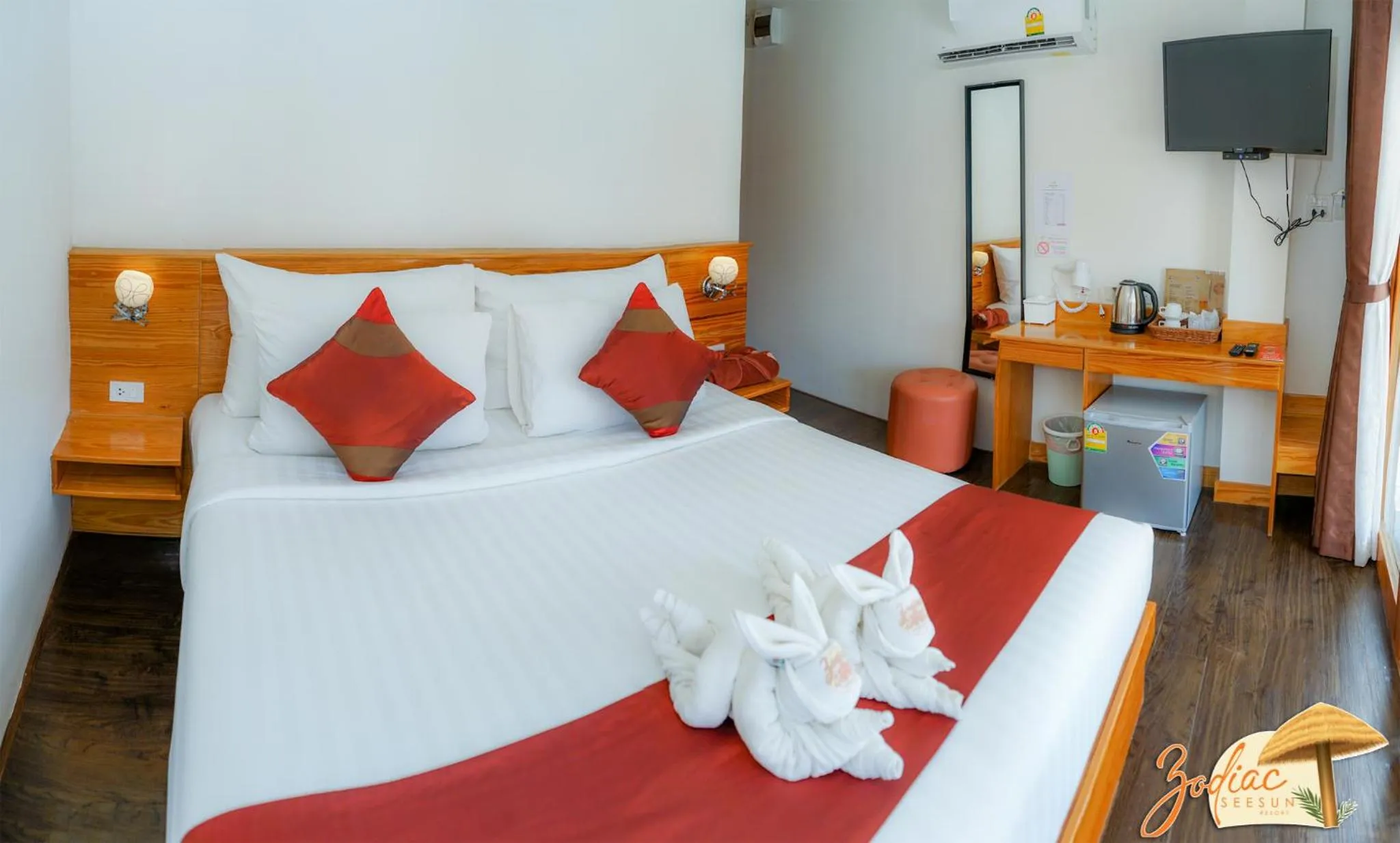 Bed in Zodiac Seesun Resort
