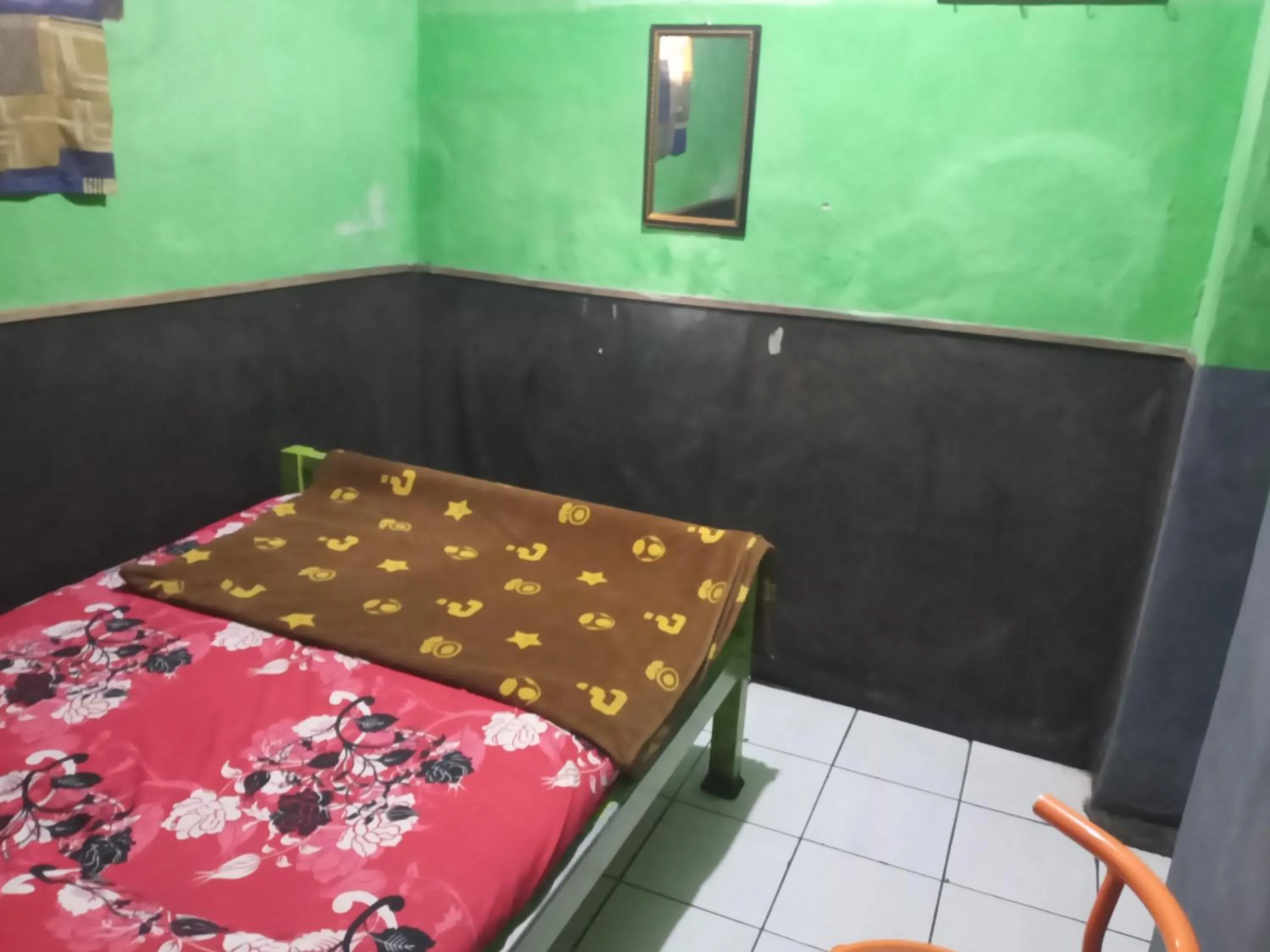 Bed in Penginapan 99