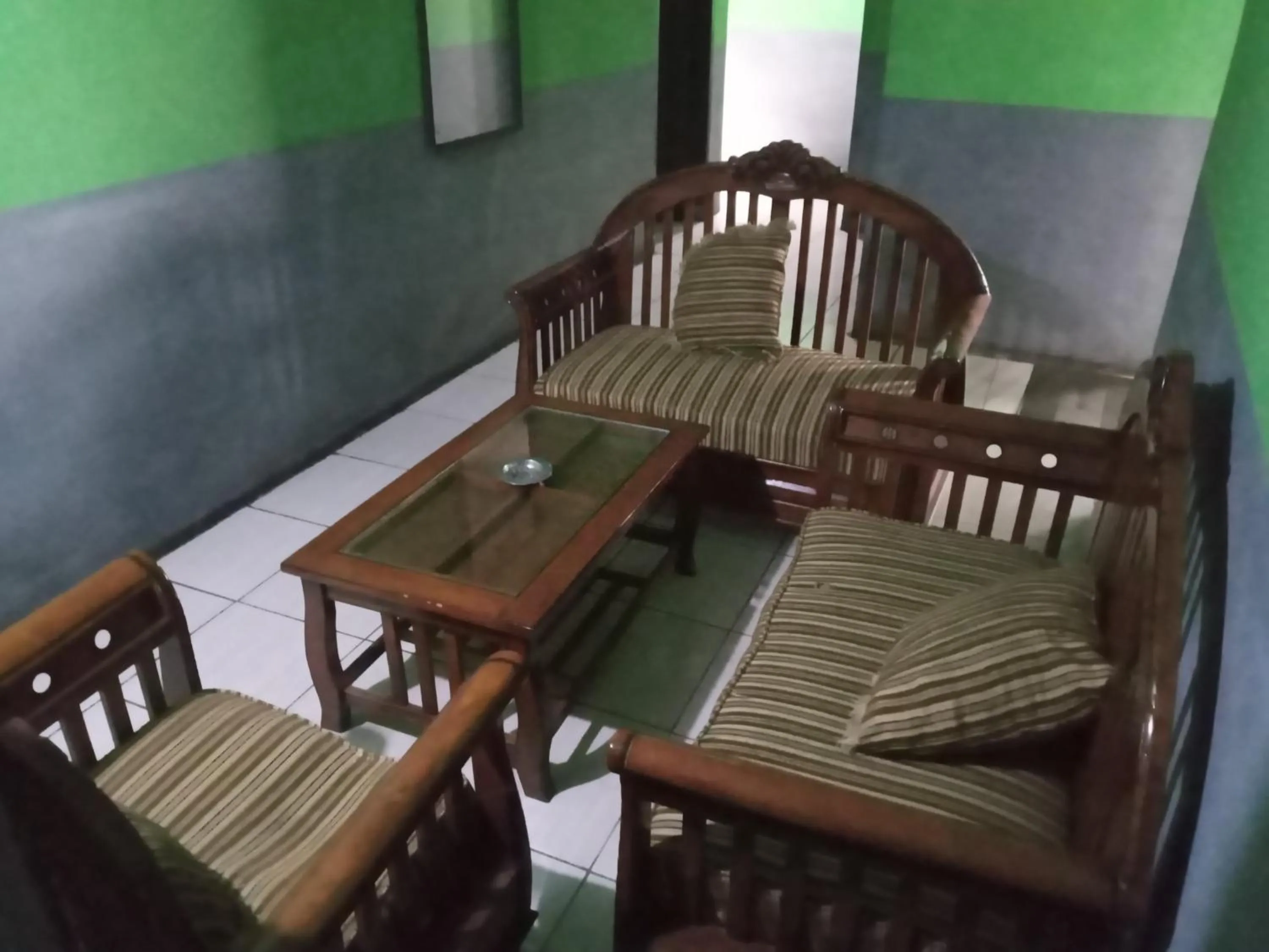 Seating area in Penginapan 99