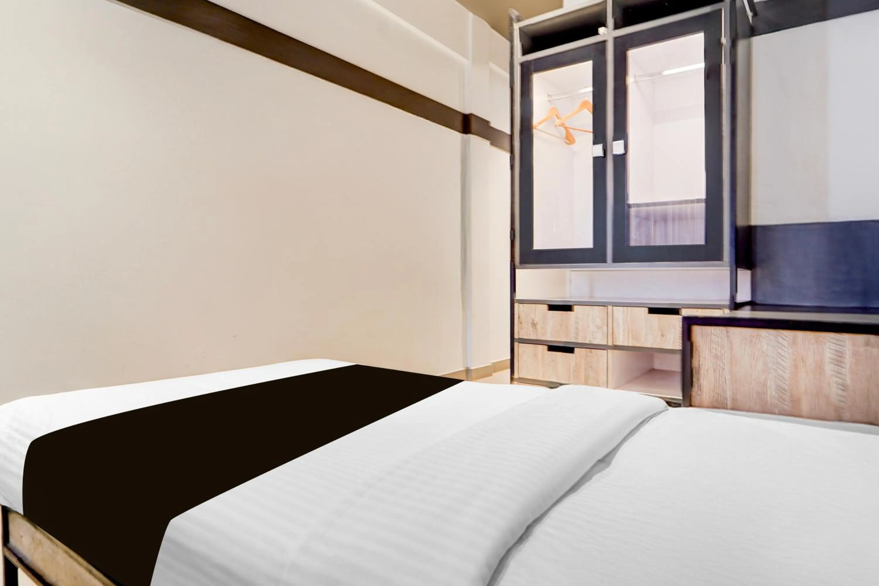 Bedroom, Bed in Super Townhouse Oak Mangalore