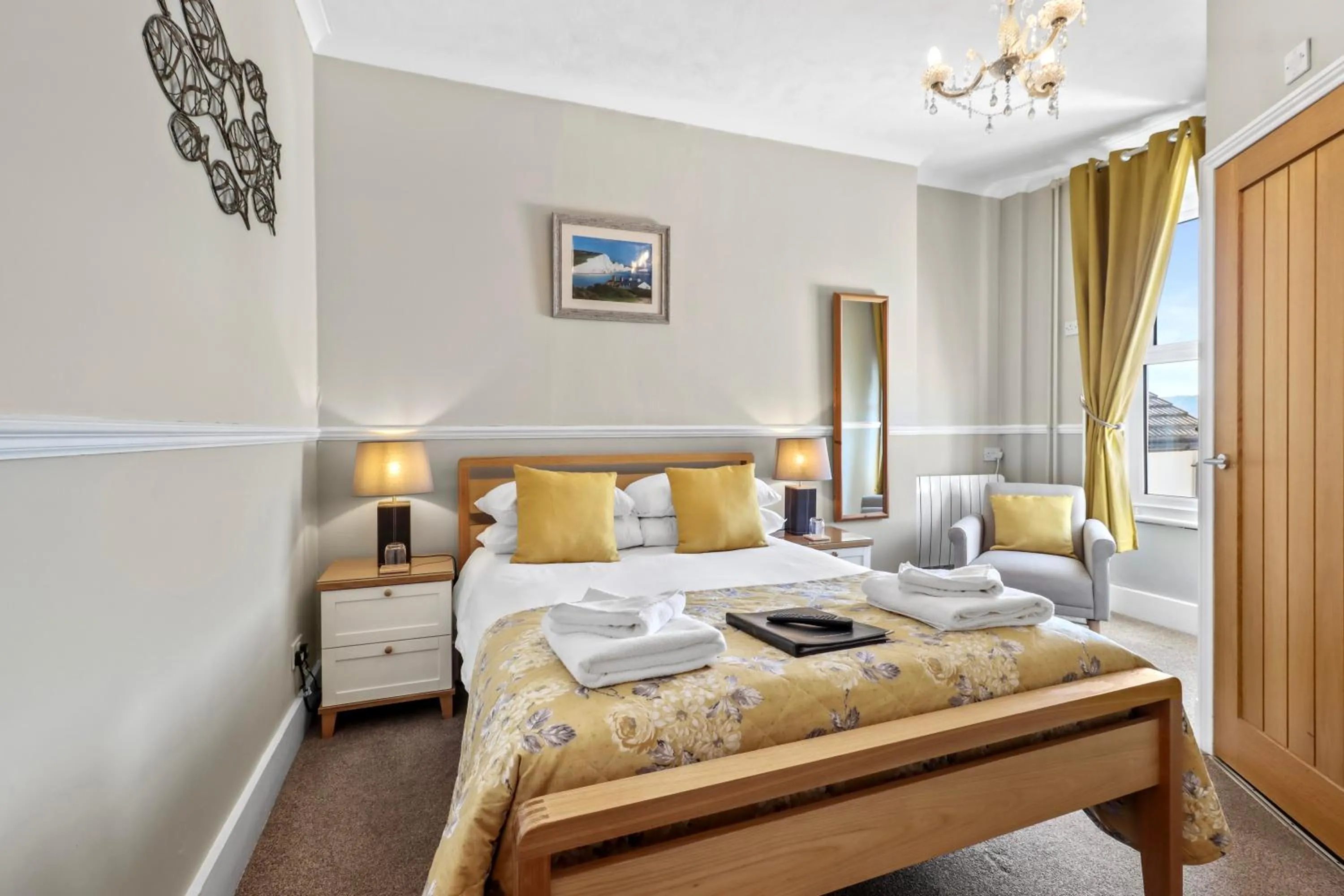 Seating area, Bed in Beach Front Guest House