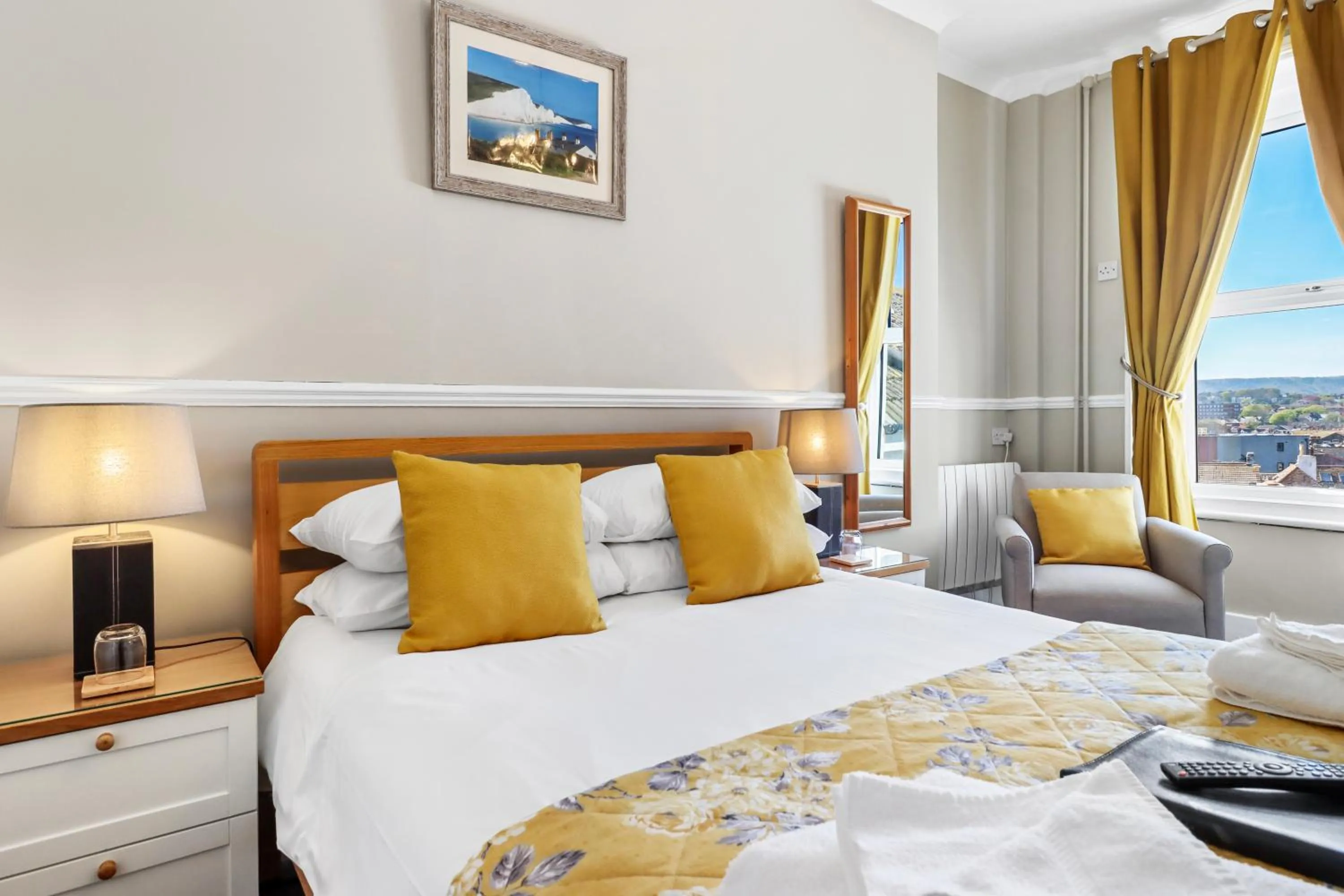 Seating area, Bed in Beach Front Guest House