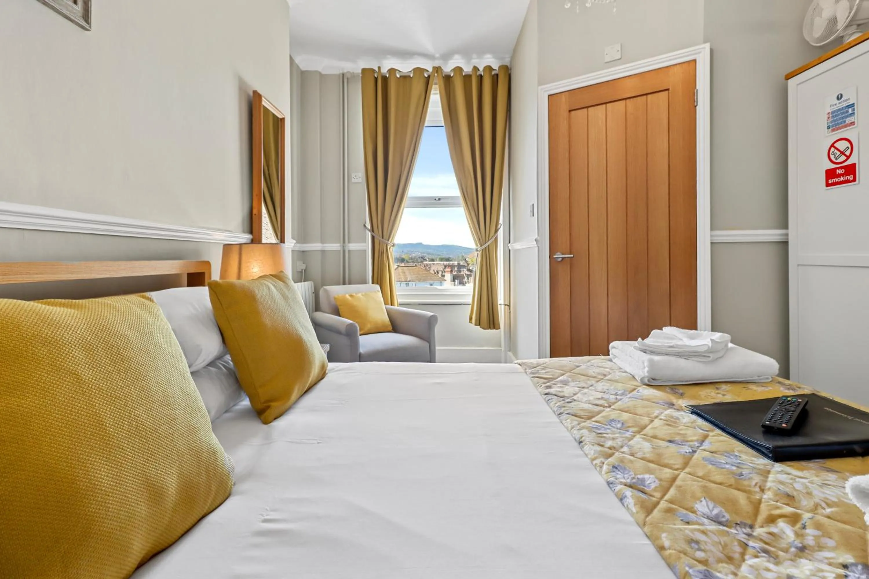 Seating area, Bed in Beach Front Guest House