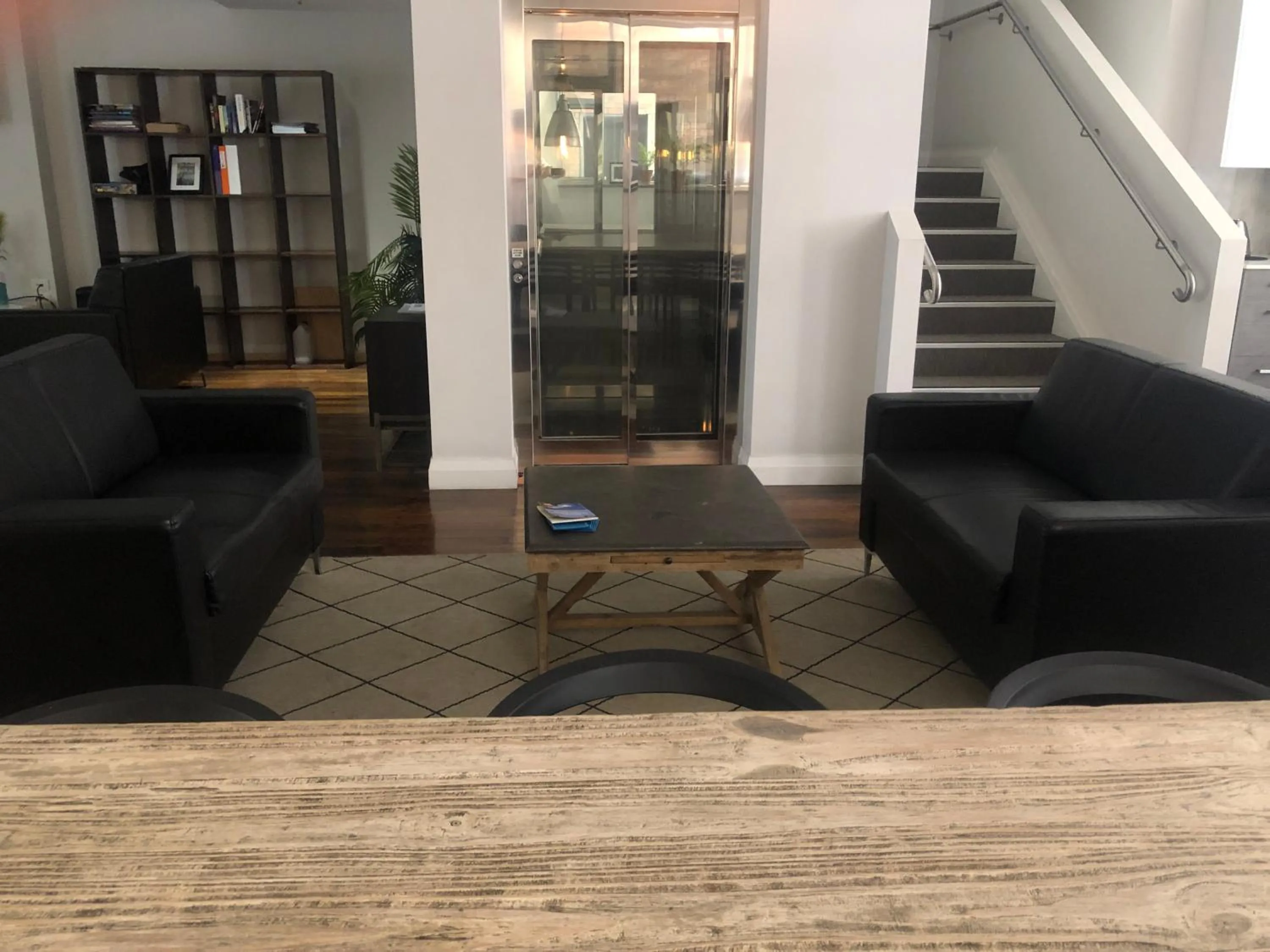 Communal lounge/ TV room in Studios on King