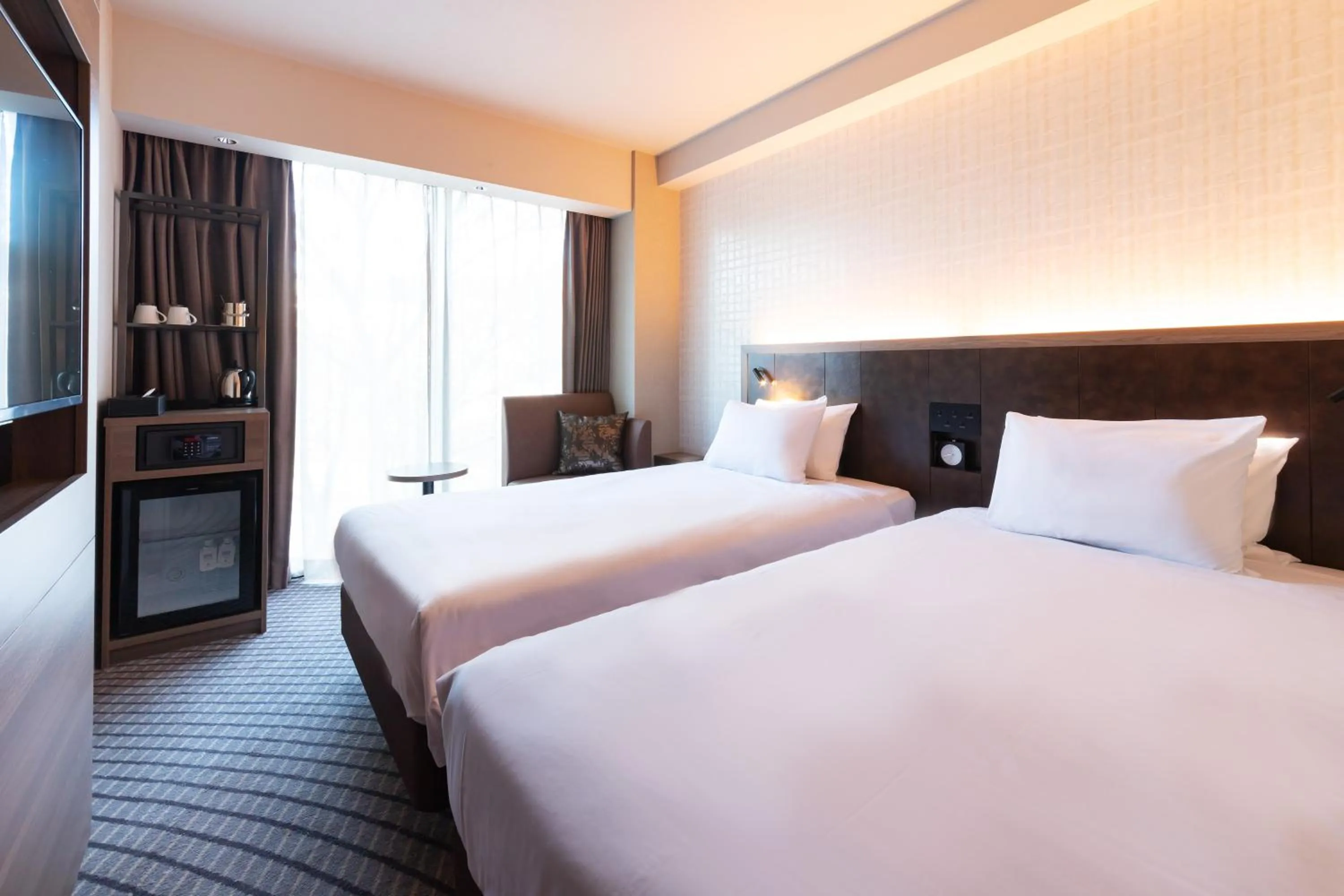 Bed in First Hotel Kanazawa