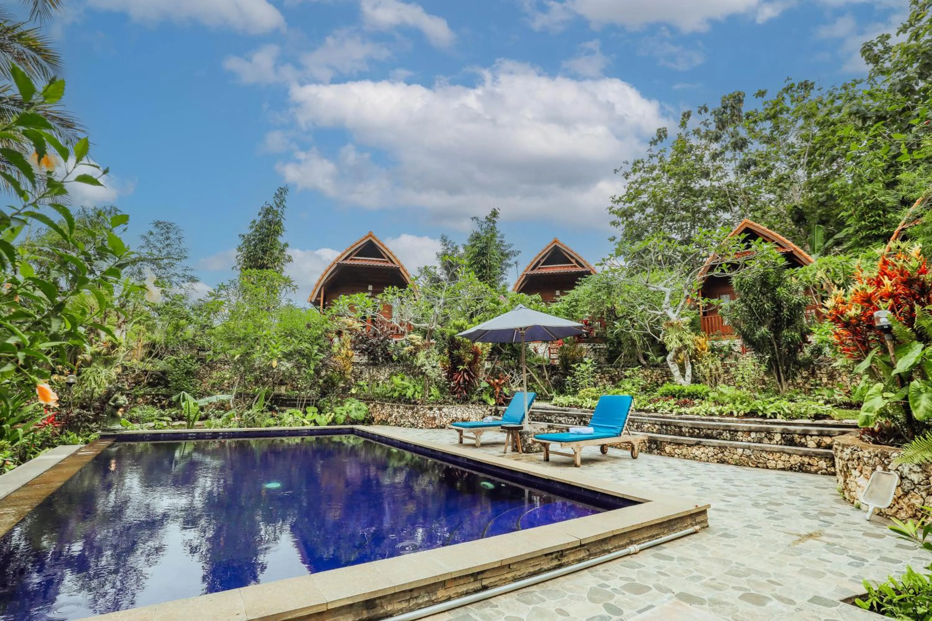 Swimming pool in The Tukad Gepuh Cottage and Resto