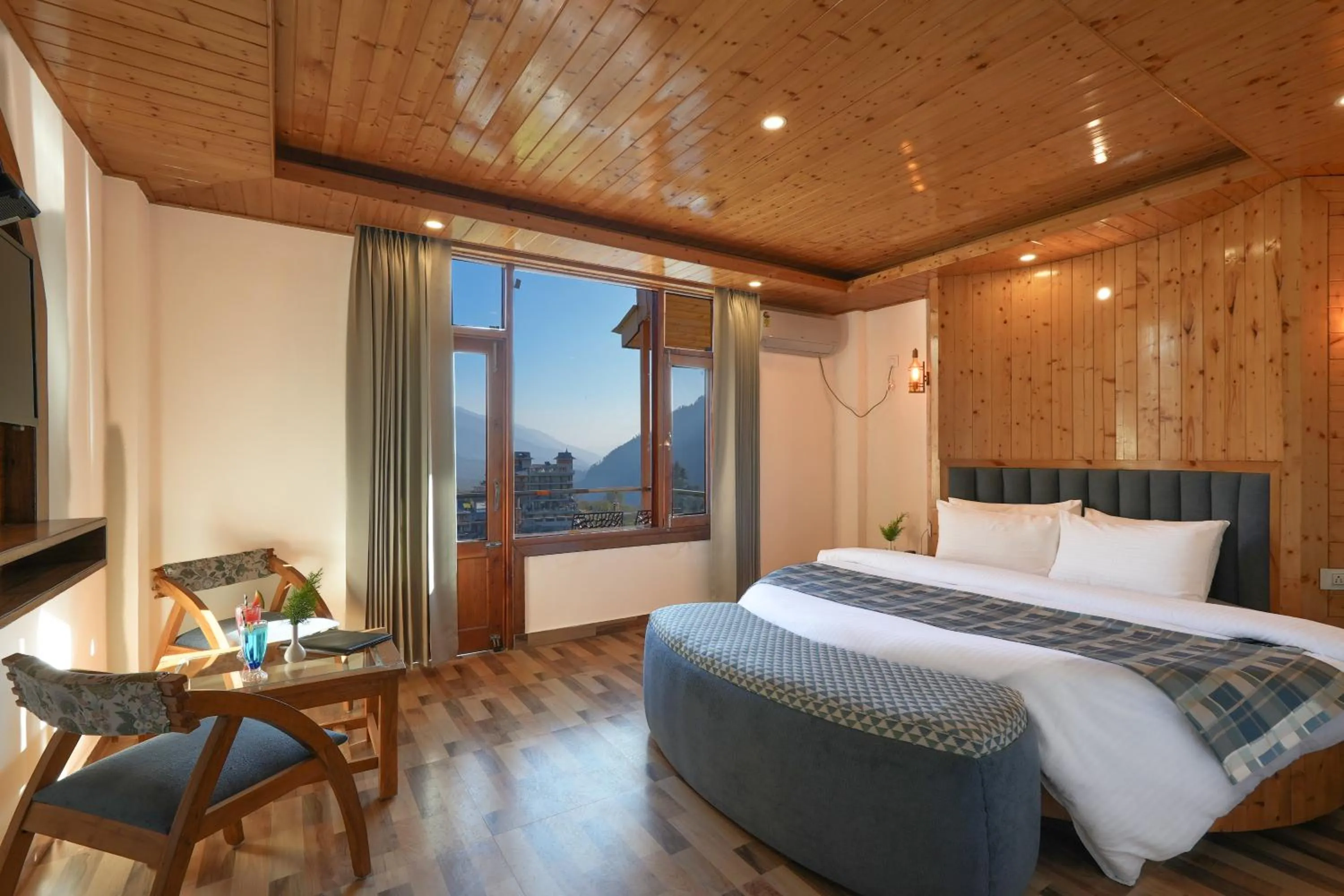 Bed in Snow City's Montana Blues Resort Manali - Heated & Air-Cooled Stay
