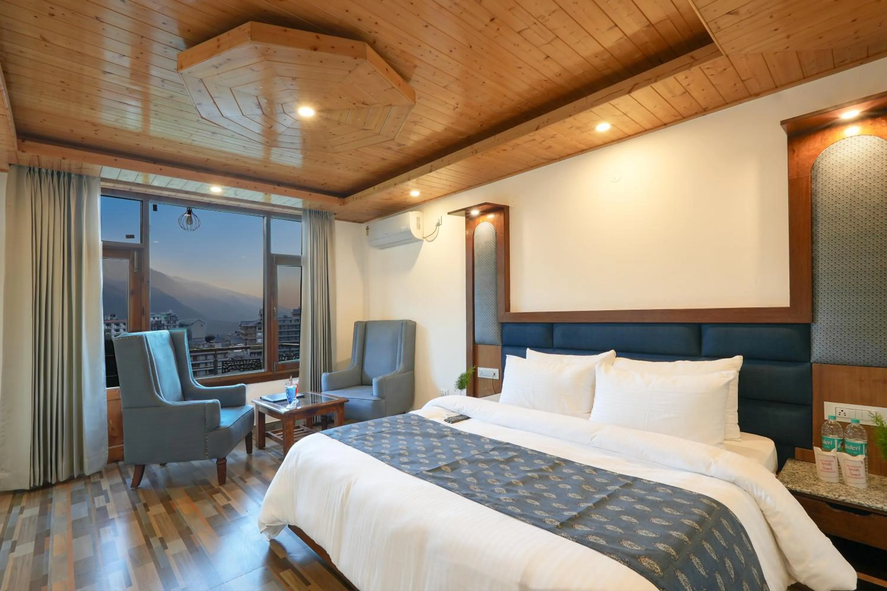Bed in Snow City's Montana Blues Resort Manali - Heated & Air-Cooled Stay