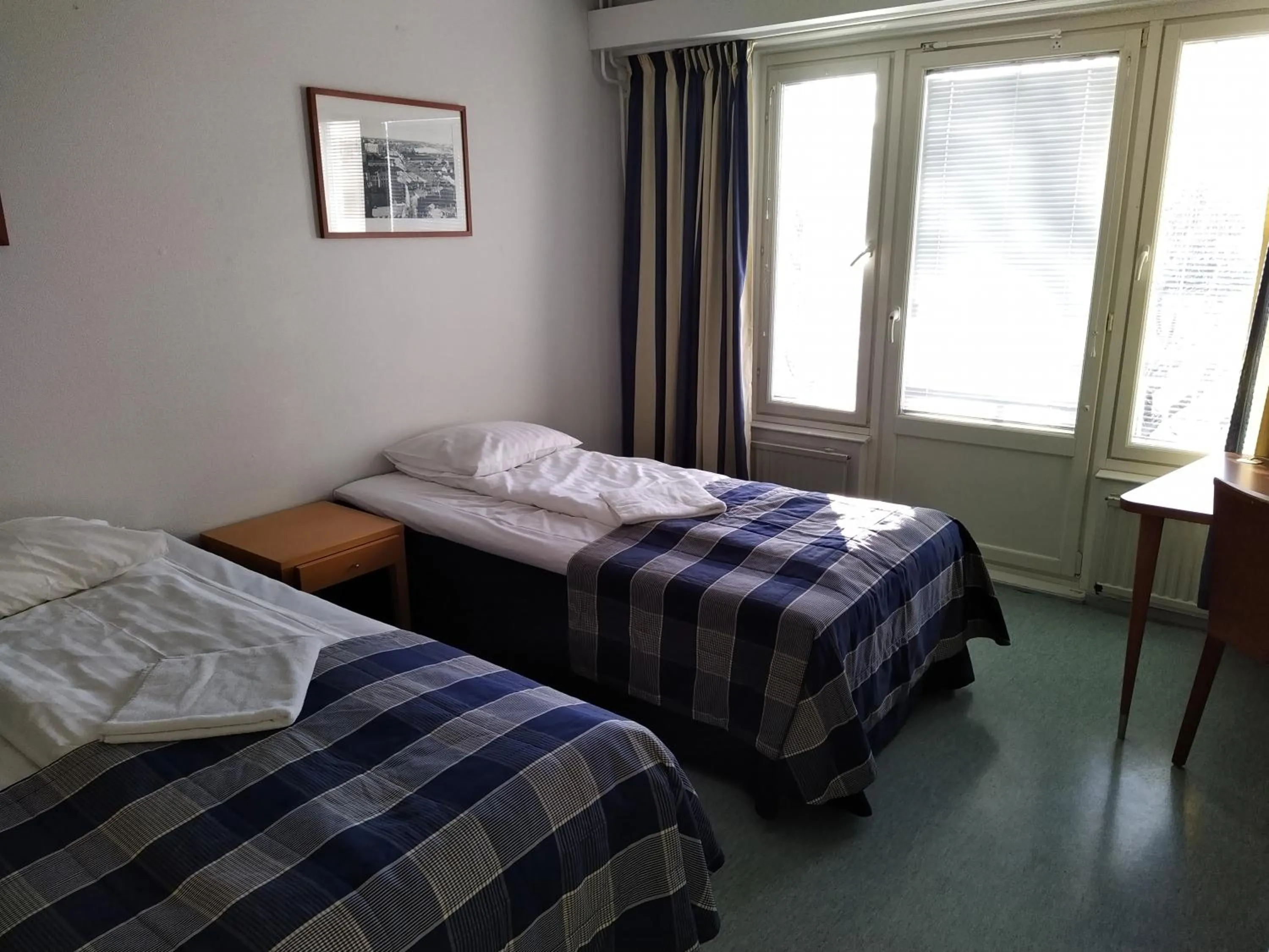 Bed in West Side Hotel