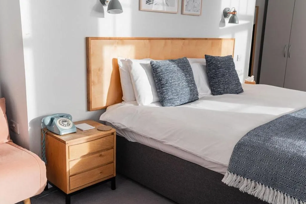 Bed in The Kingswood Hotel