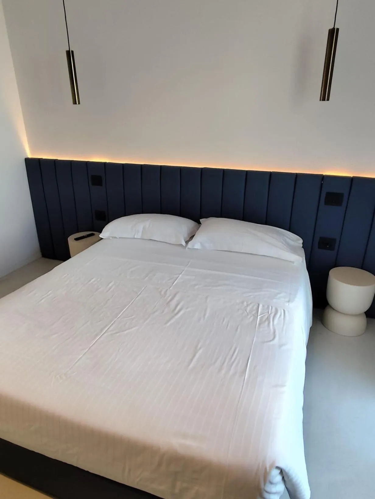 Bed in Gabbiano Suites