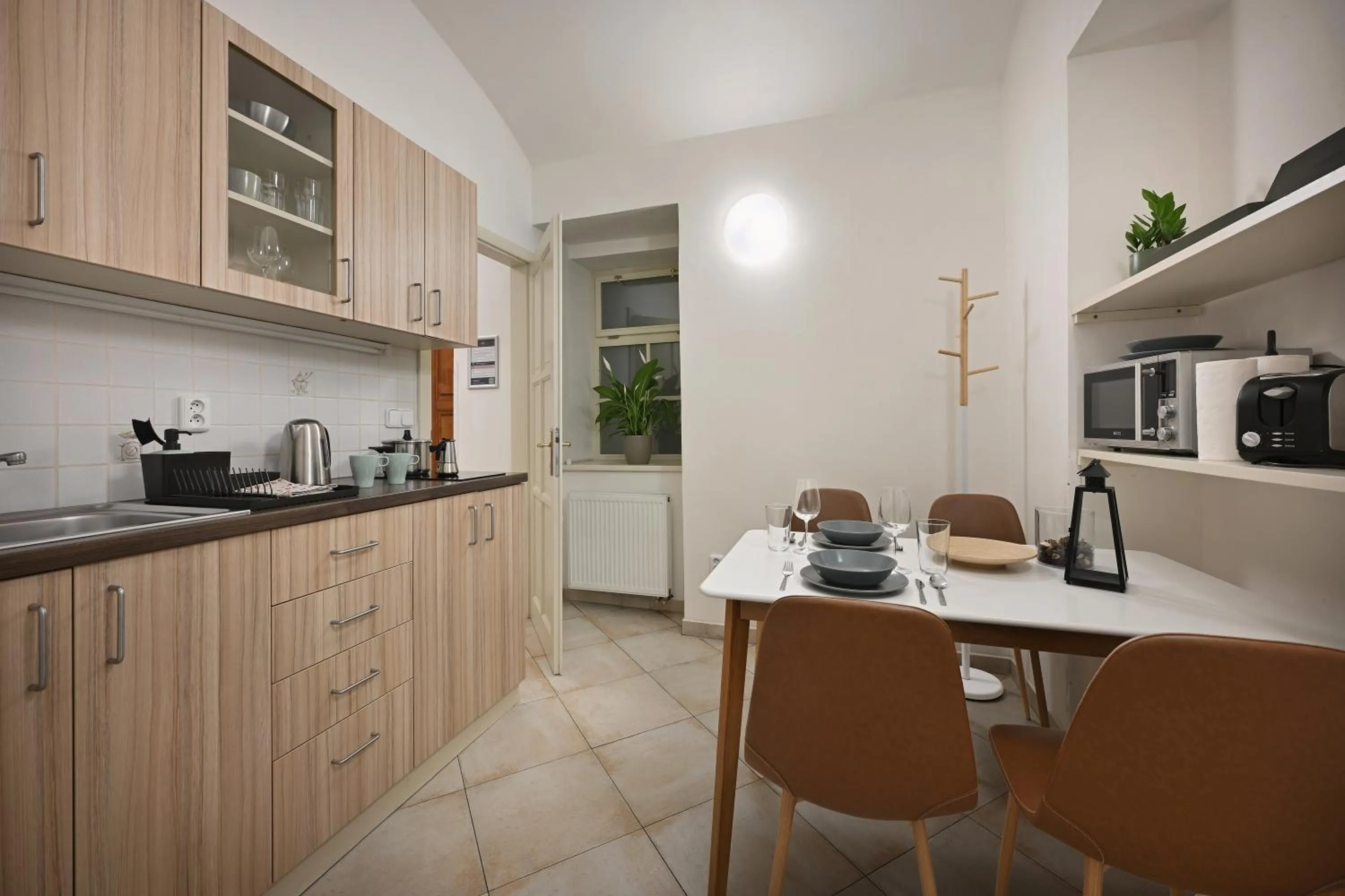 Kitchen or kitchenette in White Swan Boutique Apartments