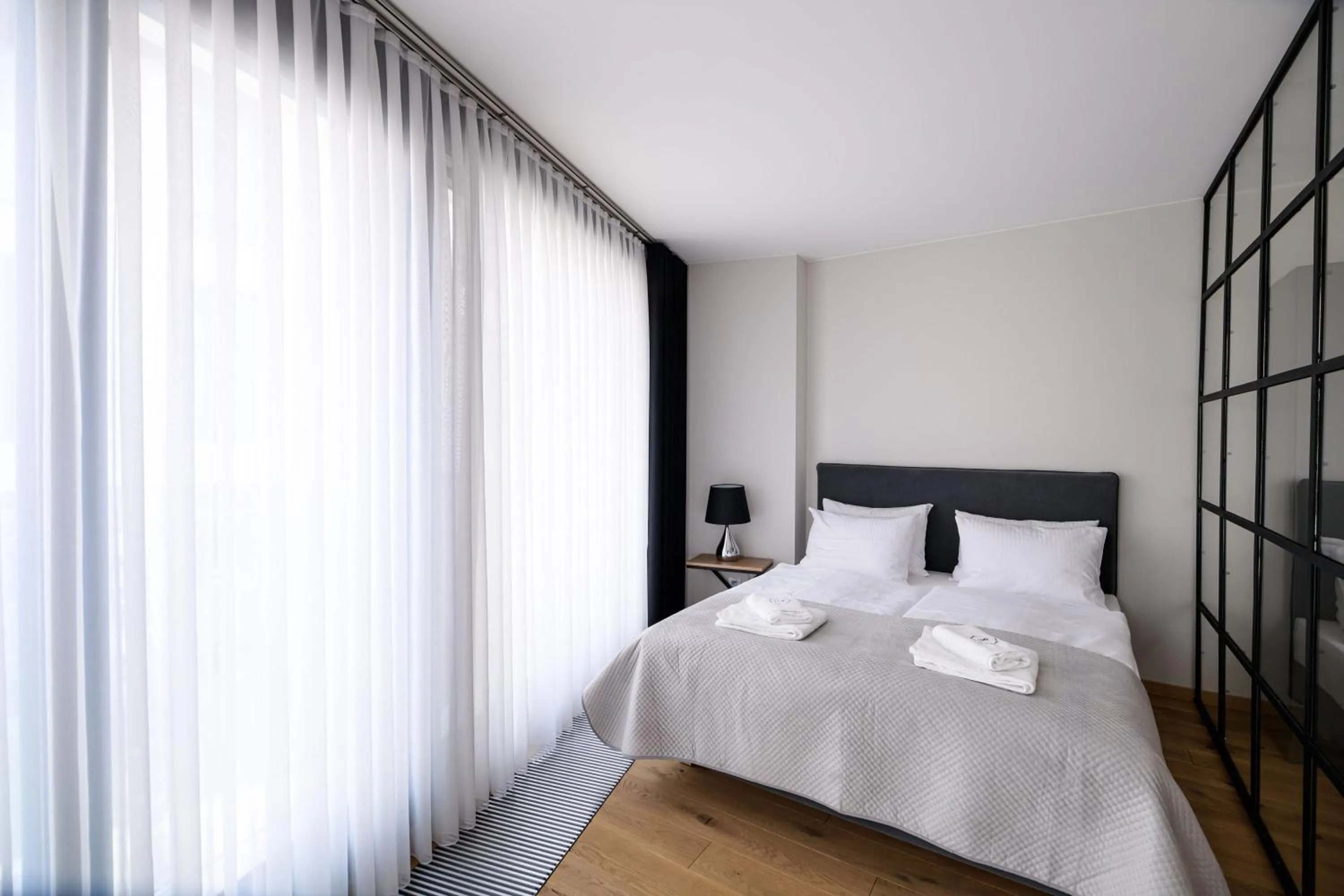Bed in Aparthotel Inspire Miodova Residence