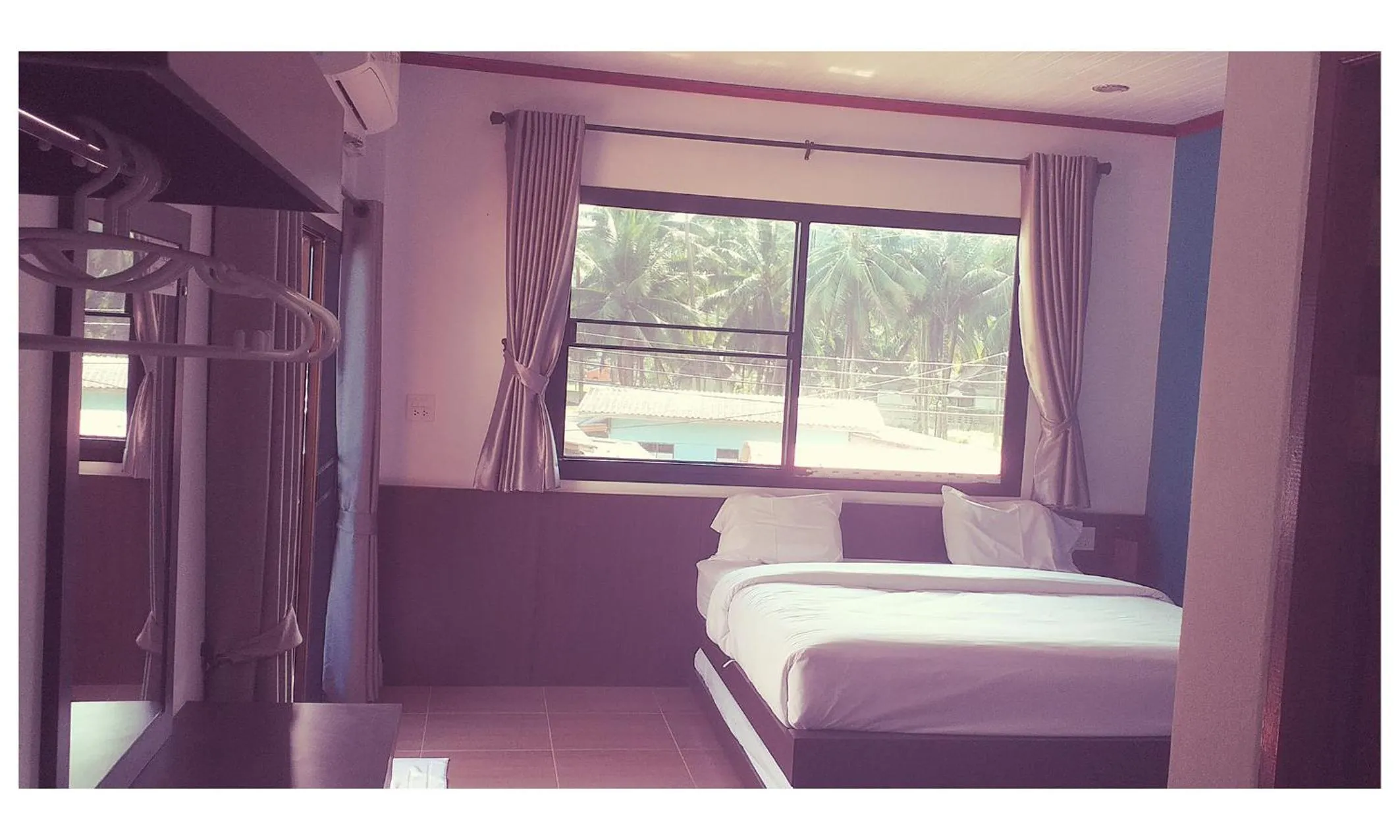 Bed in TAWAN RESORT