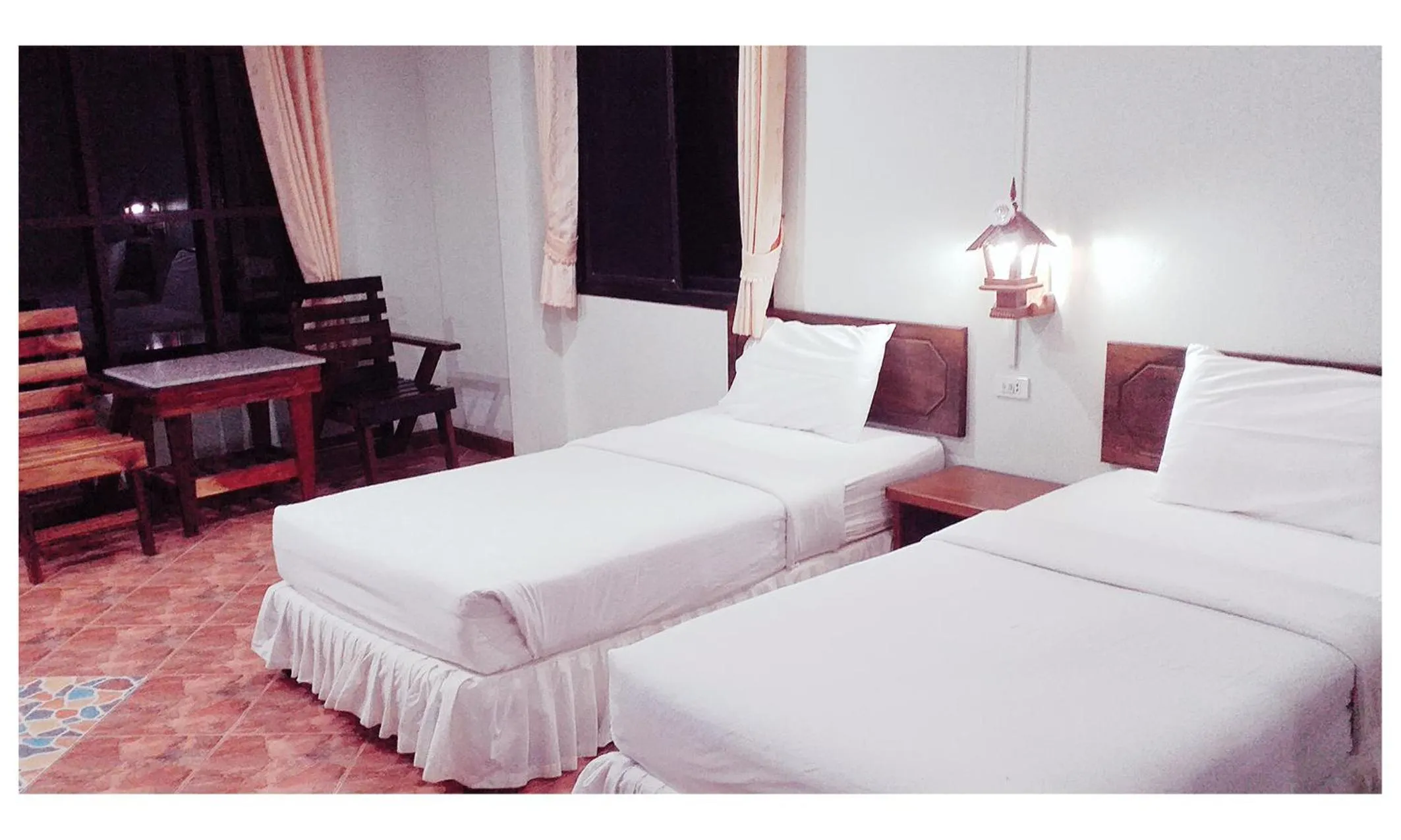 Bed in TAWAN RESORT