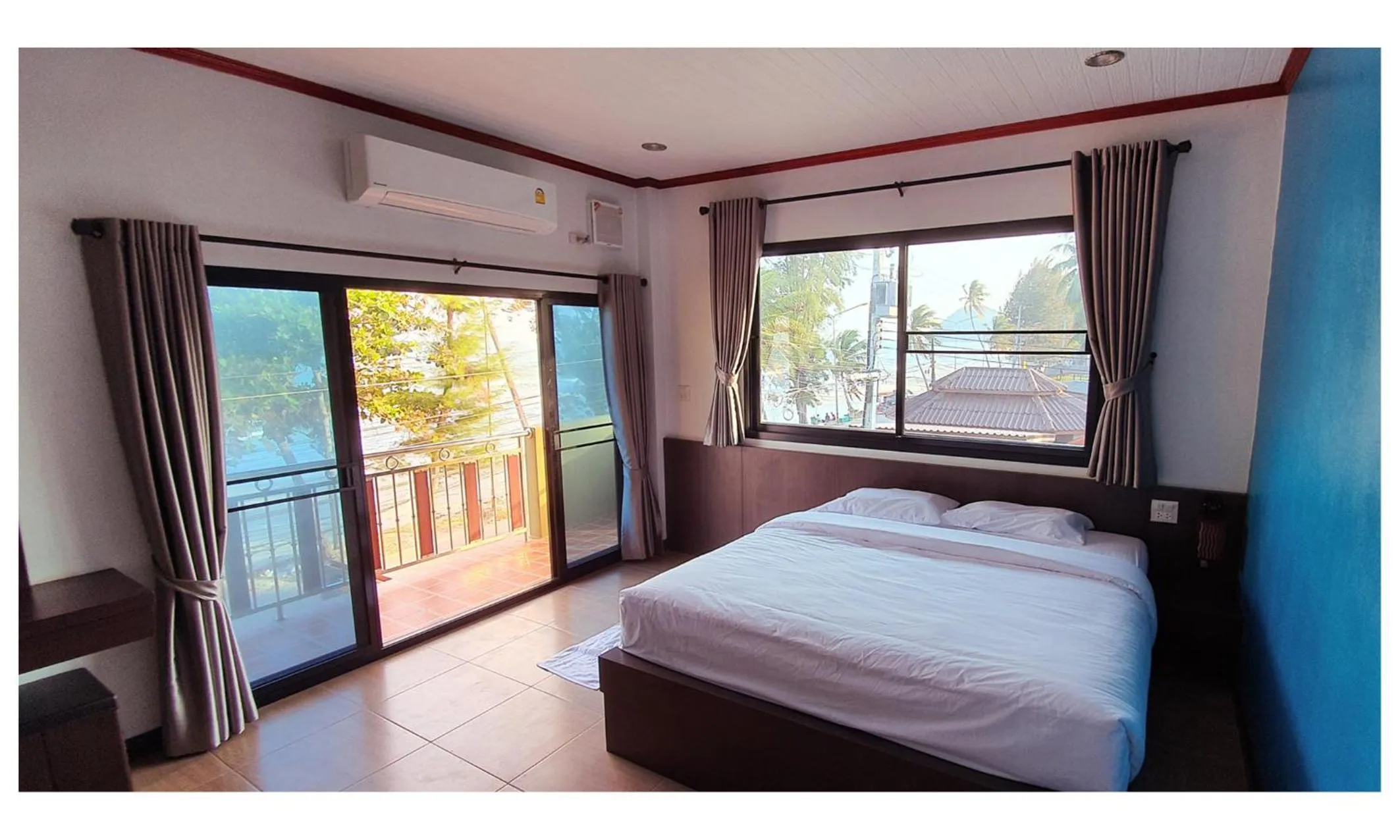 Bed in TAWAN RESORT