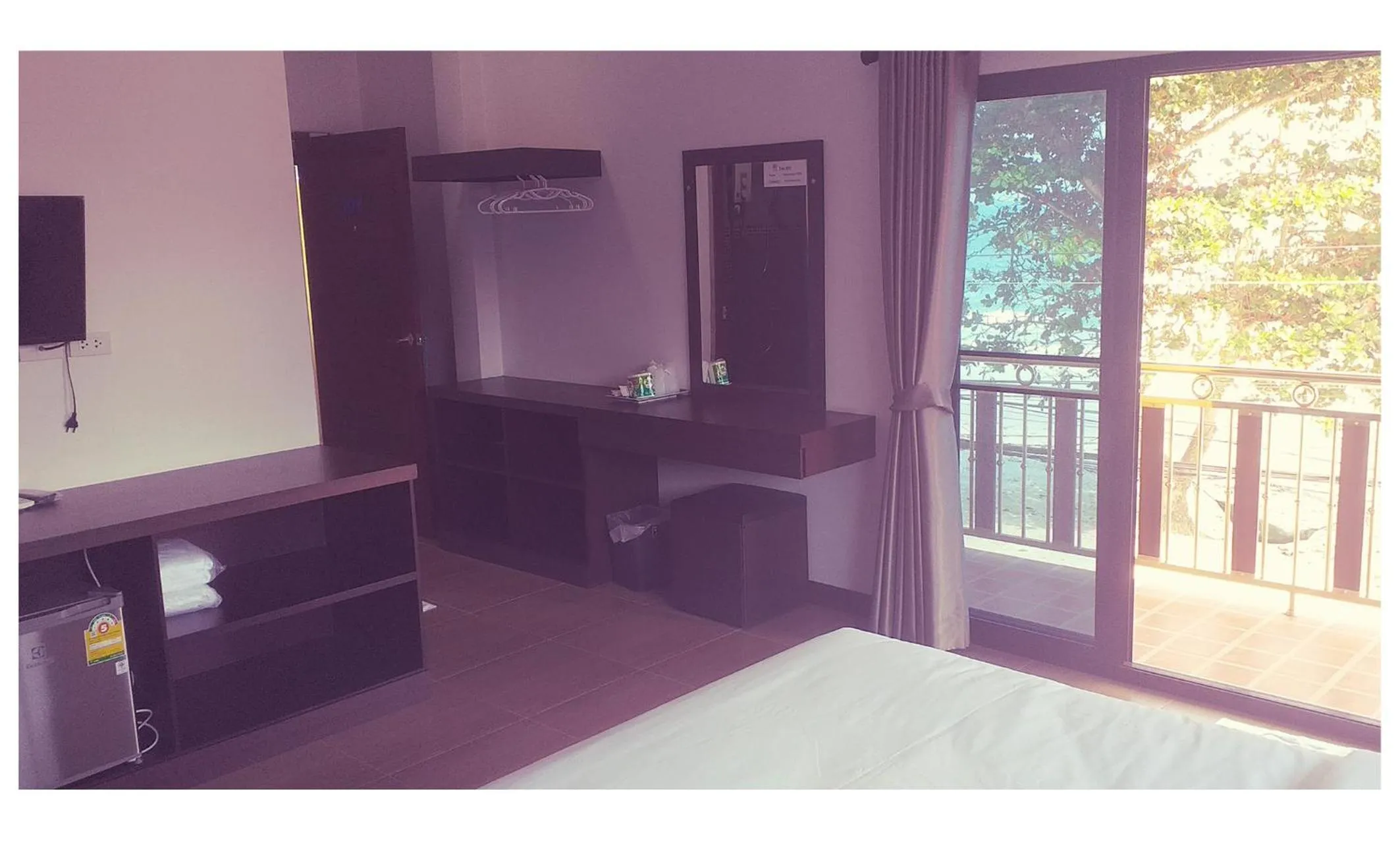 Photo of the whole room, Bed in TAWAN RESORT